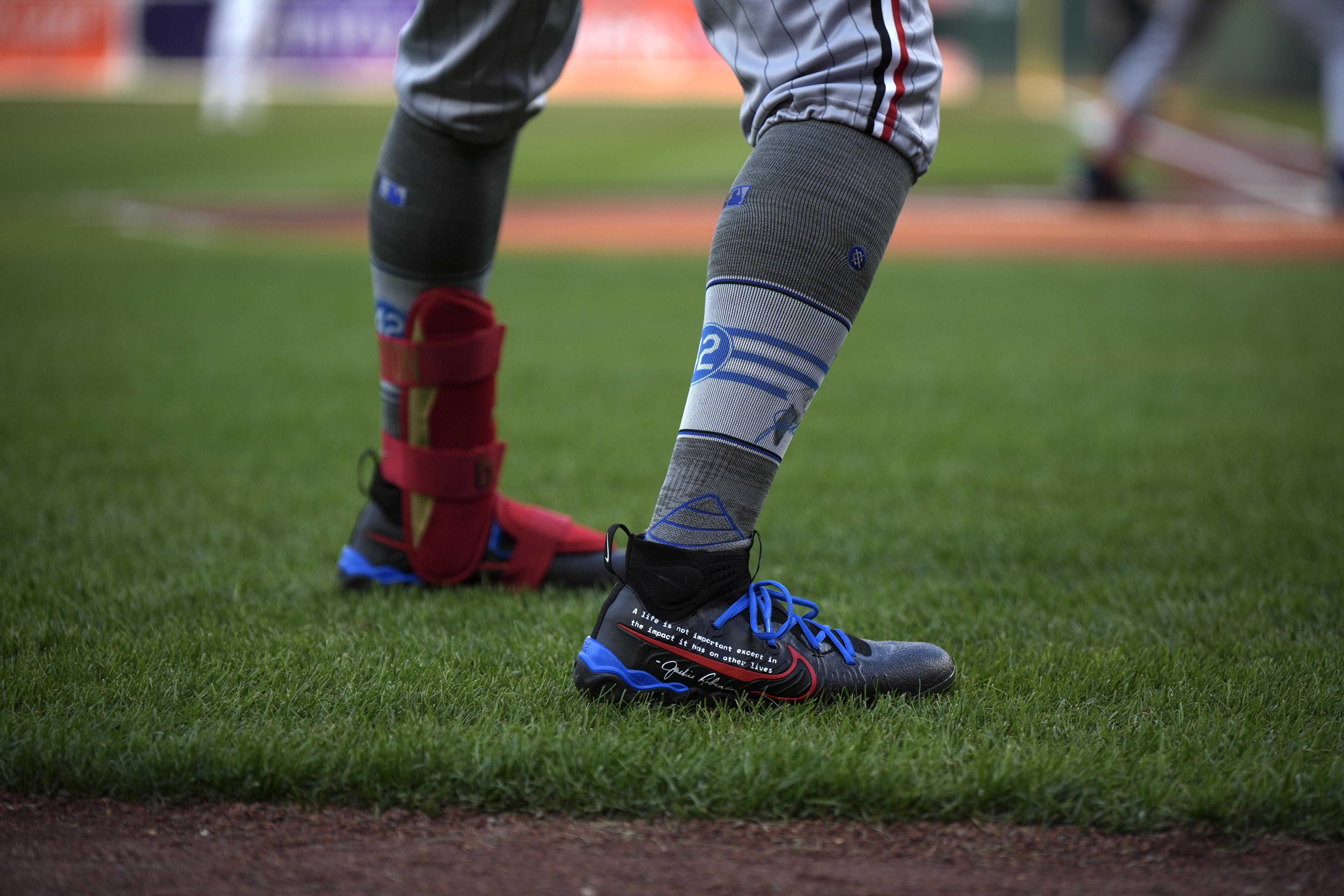 Buxton wears his custom cleats with socks featuring Robinson's No. 42. (Photo credit: Var Turner)