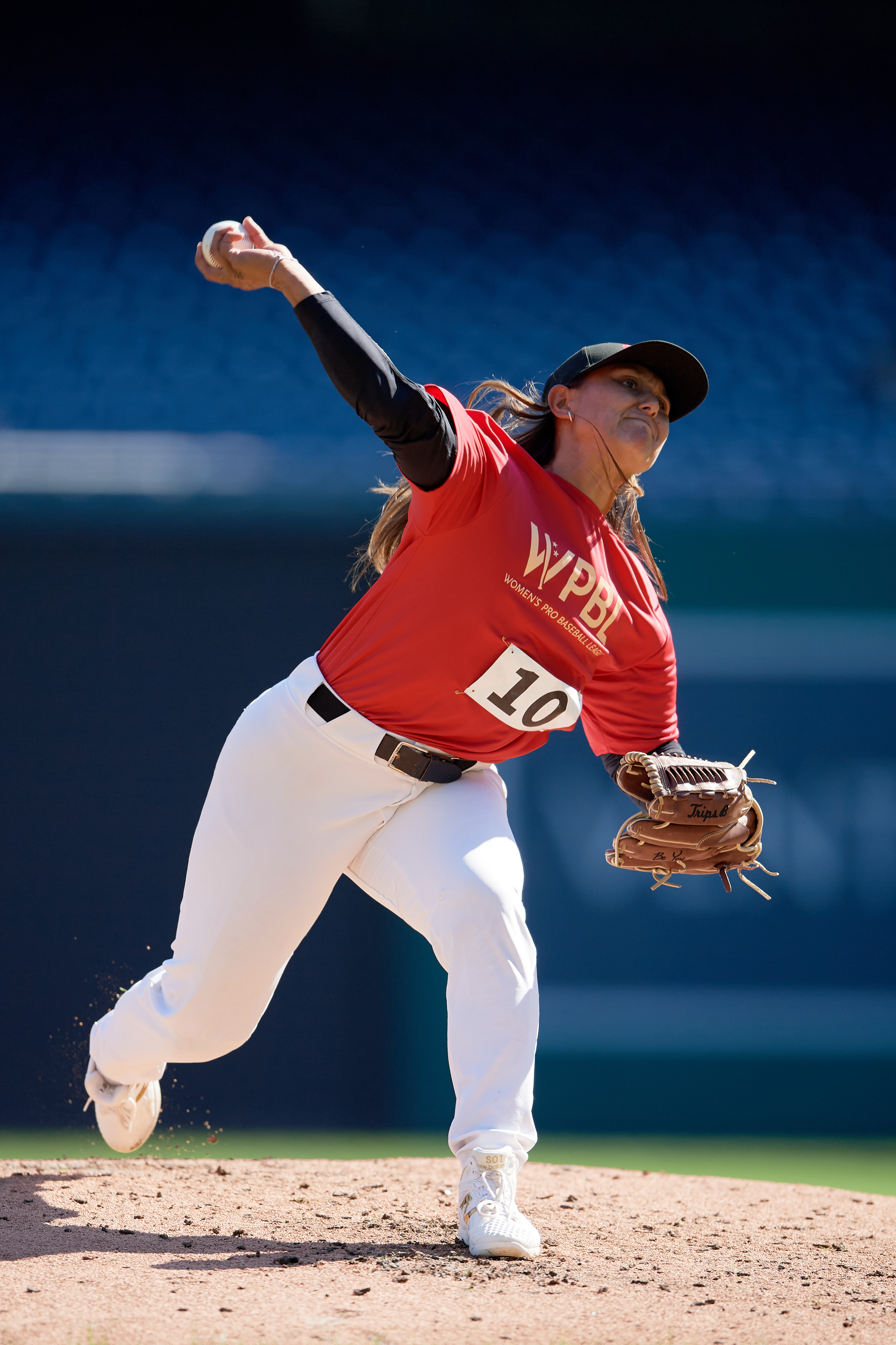 Kelsie Whitmore throws a pitch at the WPBL tryouts in August.