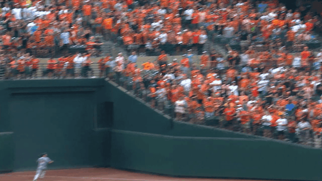 An animated gif of  Max Kepler making a sliding catch in the right-field corner