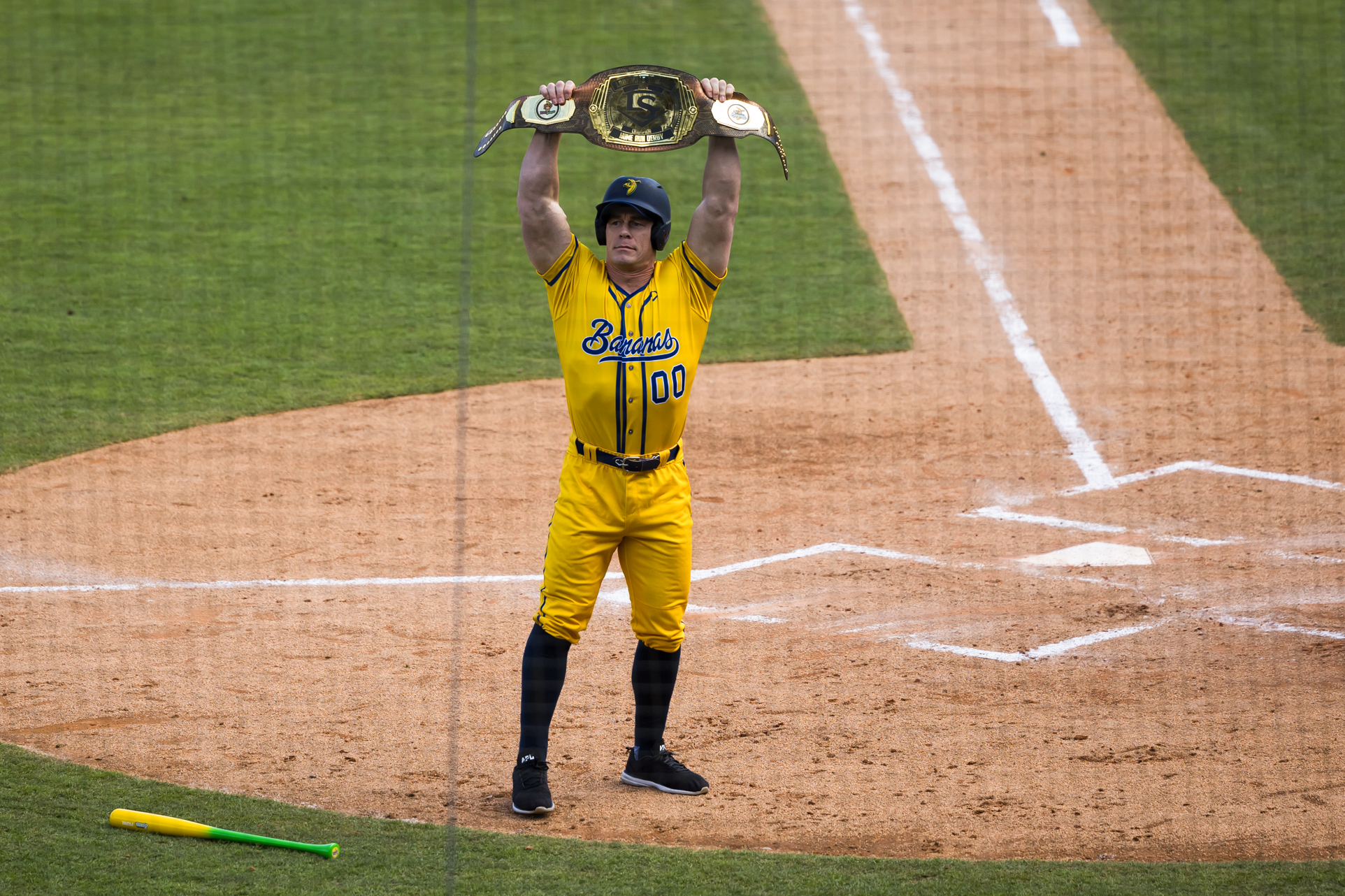 Taking an old, beloved sport and amping up the performance factor … where have we heard that before? WWE superstar John Cena showed up for the third game in Tampa and noted the similarities between Banana Ball and professional wrestling. “They play a competitive game every night where the wins and losses do matter,” Cena said. “But they make the experience about the fans, and they consistently try to push themselves.” (Photo Credit: New York Yankees)