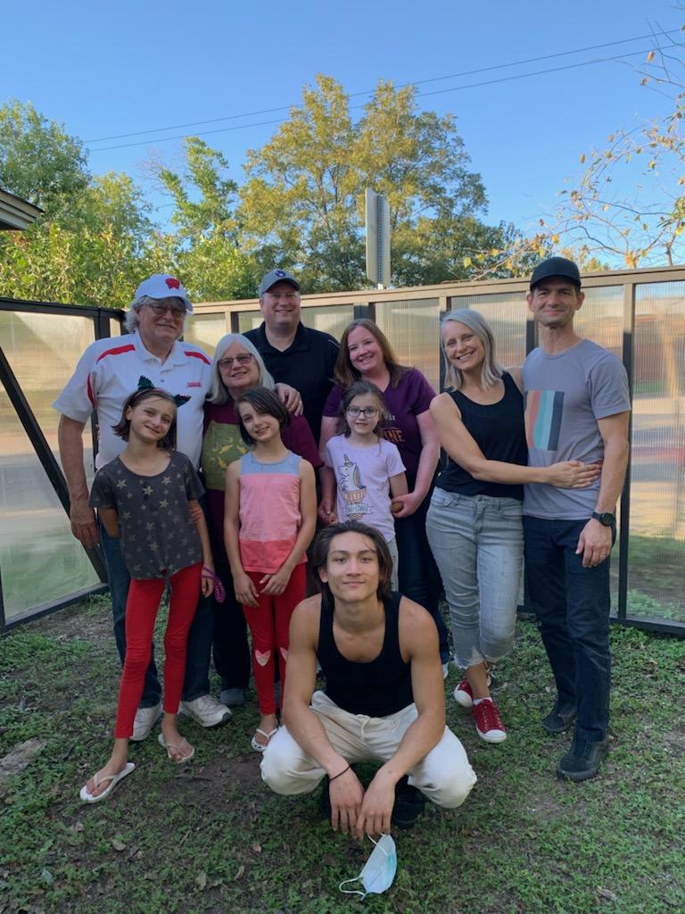 The Schraeder-Whitsett extended family, including kids (L-R) Sequoia, Fischer, Chloe and Kai (kneeling).