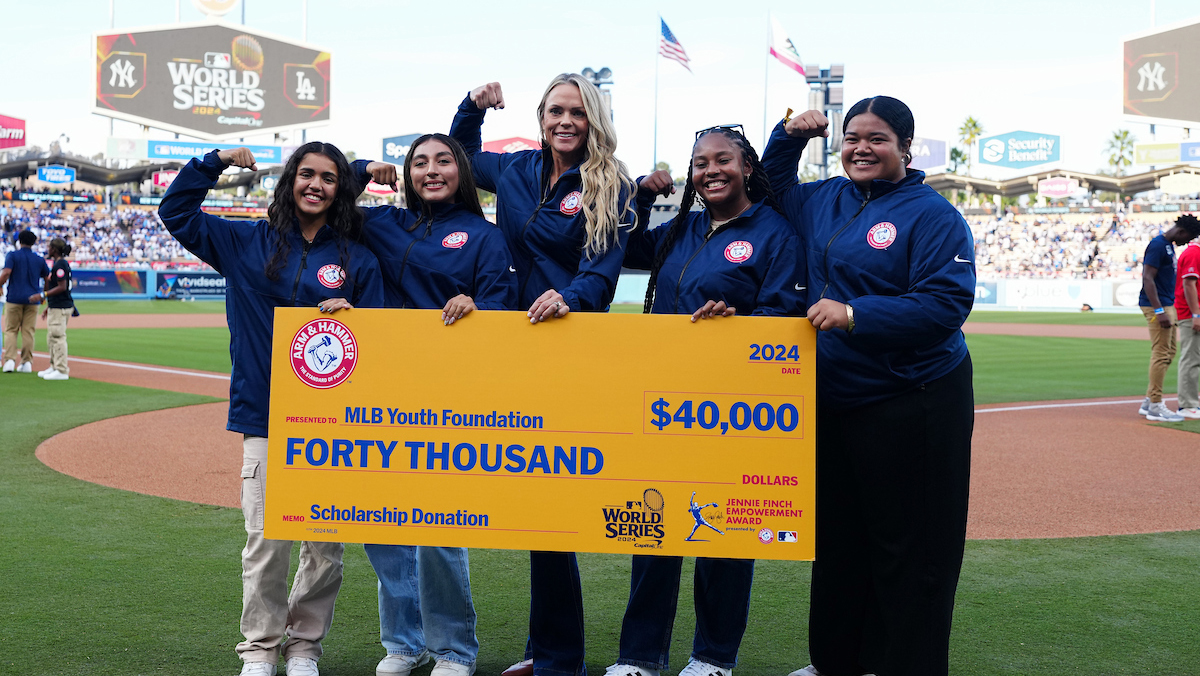 The Church & Dwight Jennie Finch Empowerment Award & Check presentation prior to Game 2 of the 2024 World Series presented by Capital One between the New York Yankees and the Los Angeles Dodgers at Dodger Stadium on Oct. 26, 2024, in Los Angeles (Mary DeCicco/MLB Photos via Getty Images)