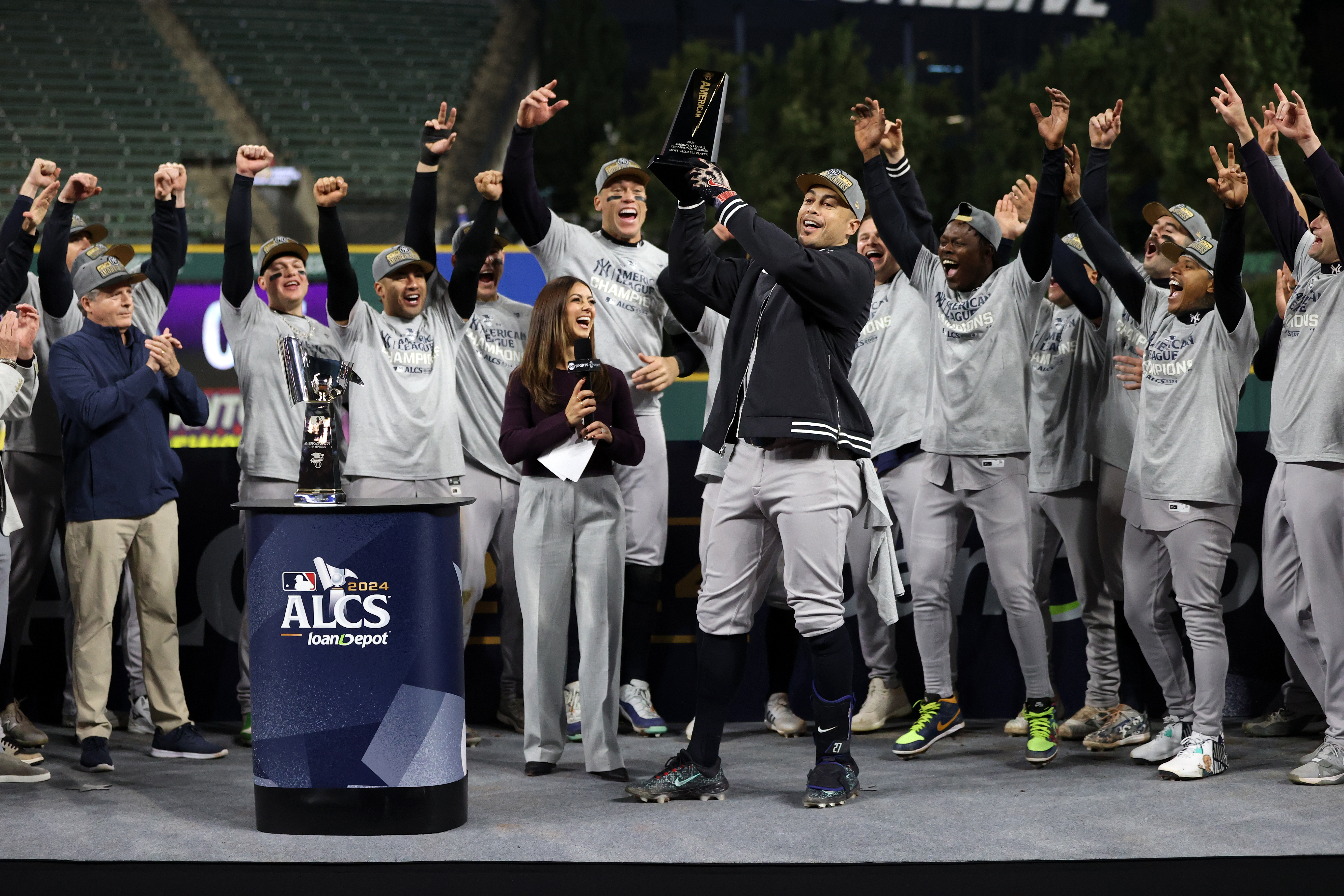 The year before he was traded to the Yankees, Stanton earned National League MVP honors with the Marlins. His performance against the Guardians last year helped Stanton add an ALCS MVP Award to his trophy case, but more than any shiny baubles, he enjoyed the celebration of another hill summited with his teammates. “That was something that pulled us closer,” Stanton said. (Photo Credit: New York Yankees)