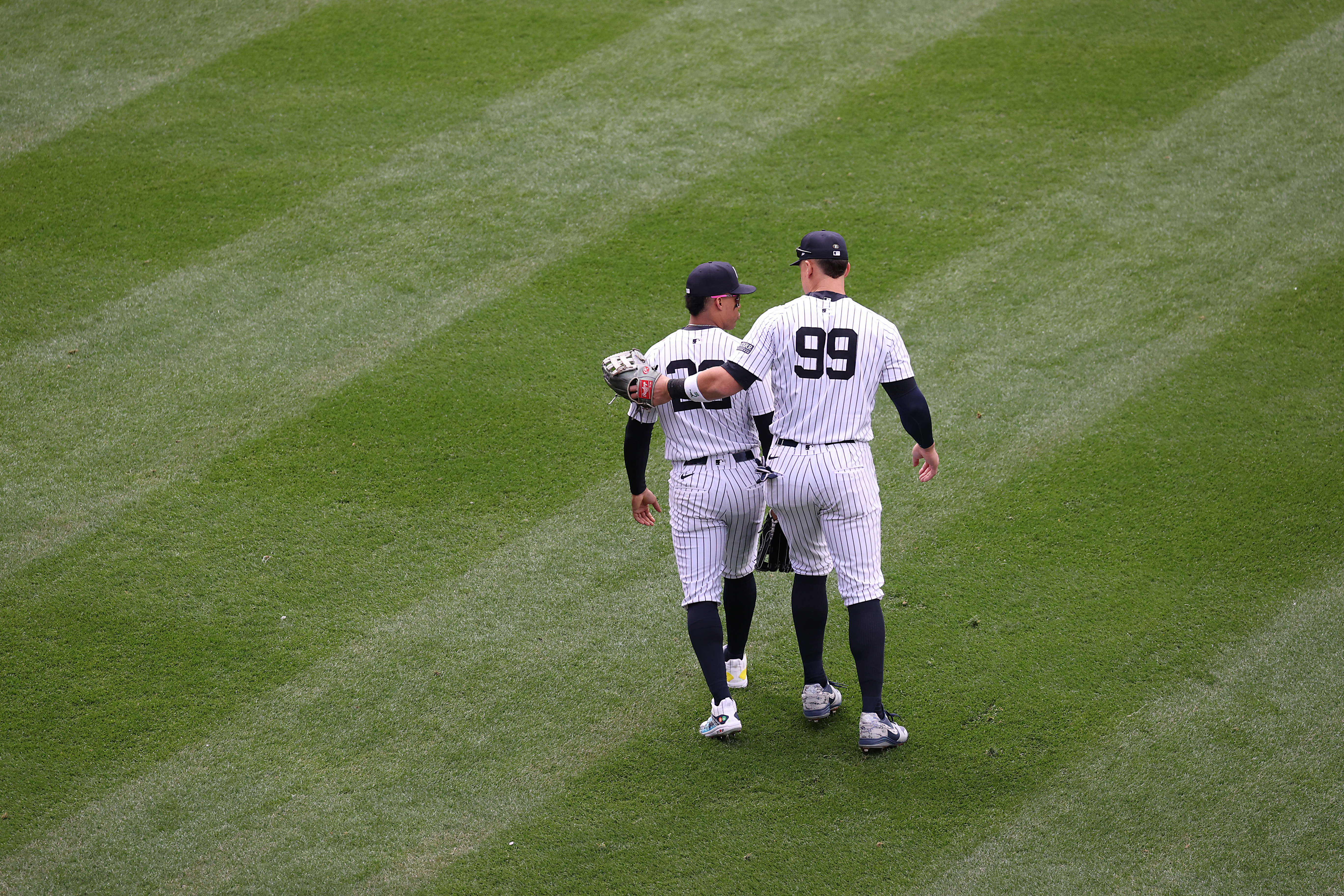 From the moment the team announced the trade that brought Juan Soto (left) to New York, everyone expected a lovefest from the fans in the Bronx. They more than delivered on their end, and the right fielder was sure to return the love to everyone in the Stadium during the April 5 home opener, from the Bleacher Creatures to his new captain and outfield mate, Aaron Judge. (Photo Credit: New York Yankees)