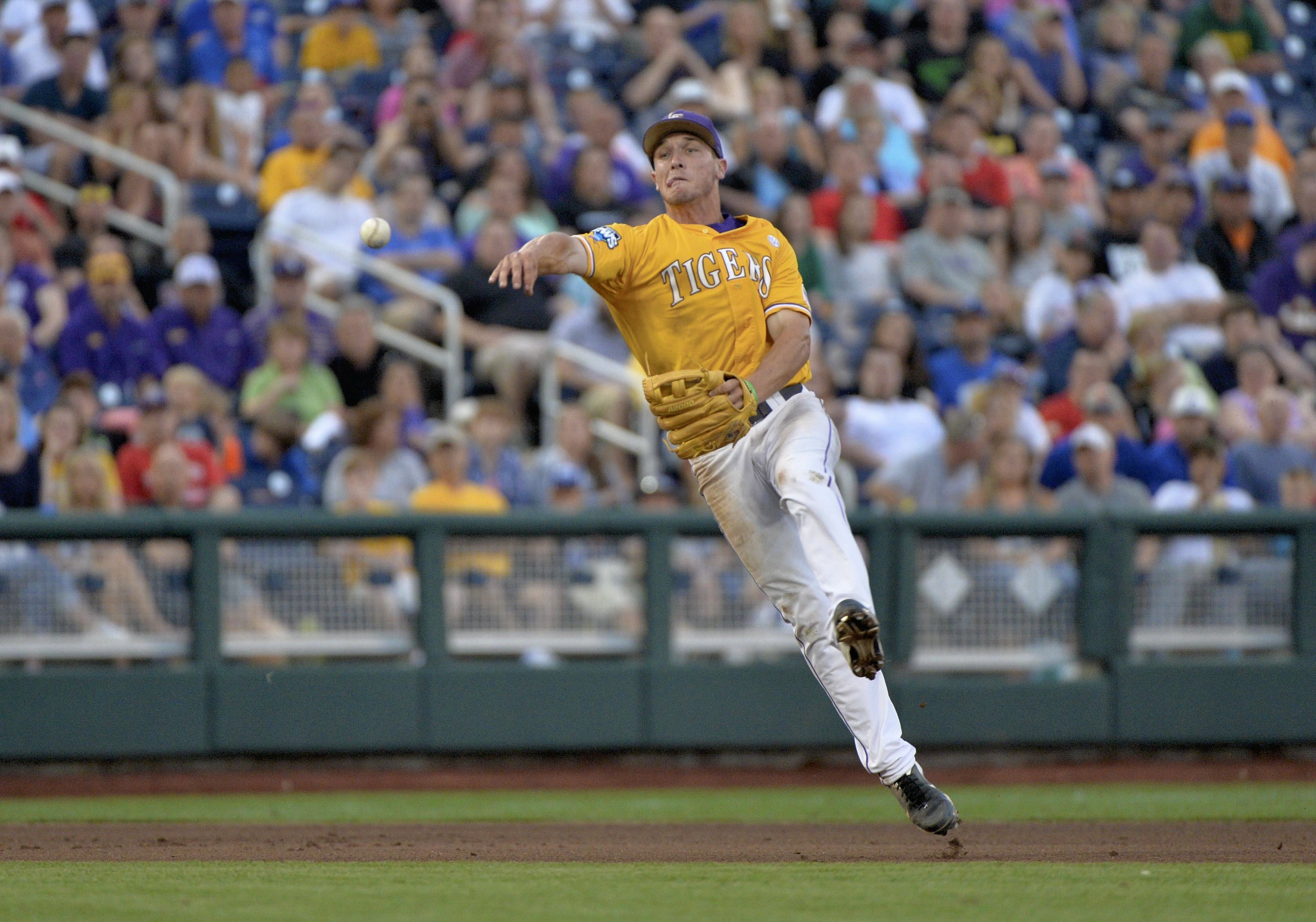 Alex Bregman playing third base for LSU in 2015 (AP Images)