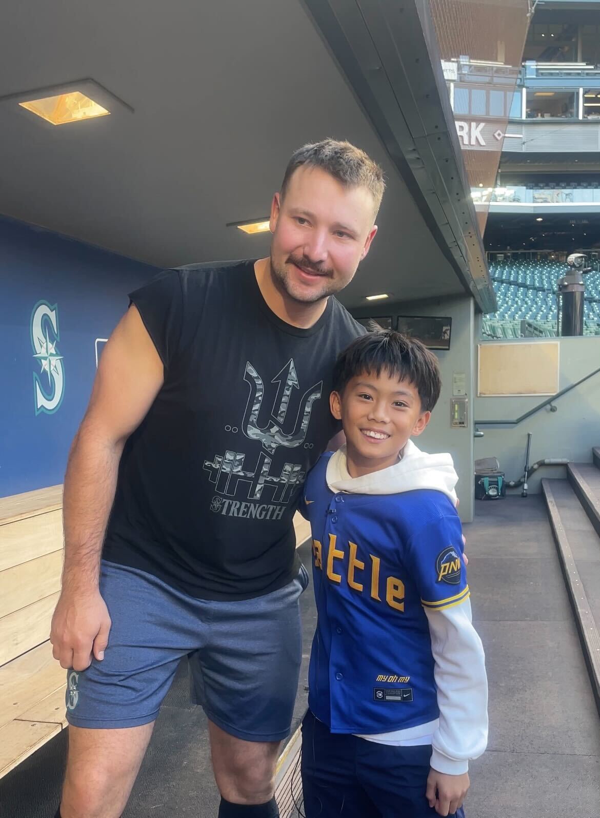 Cal Raleigh poses with Marcus.