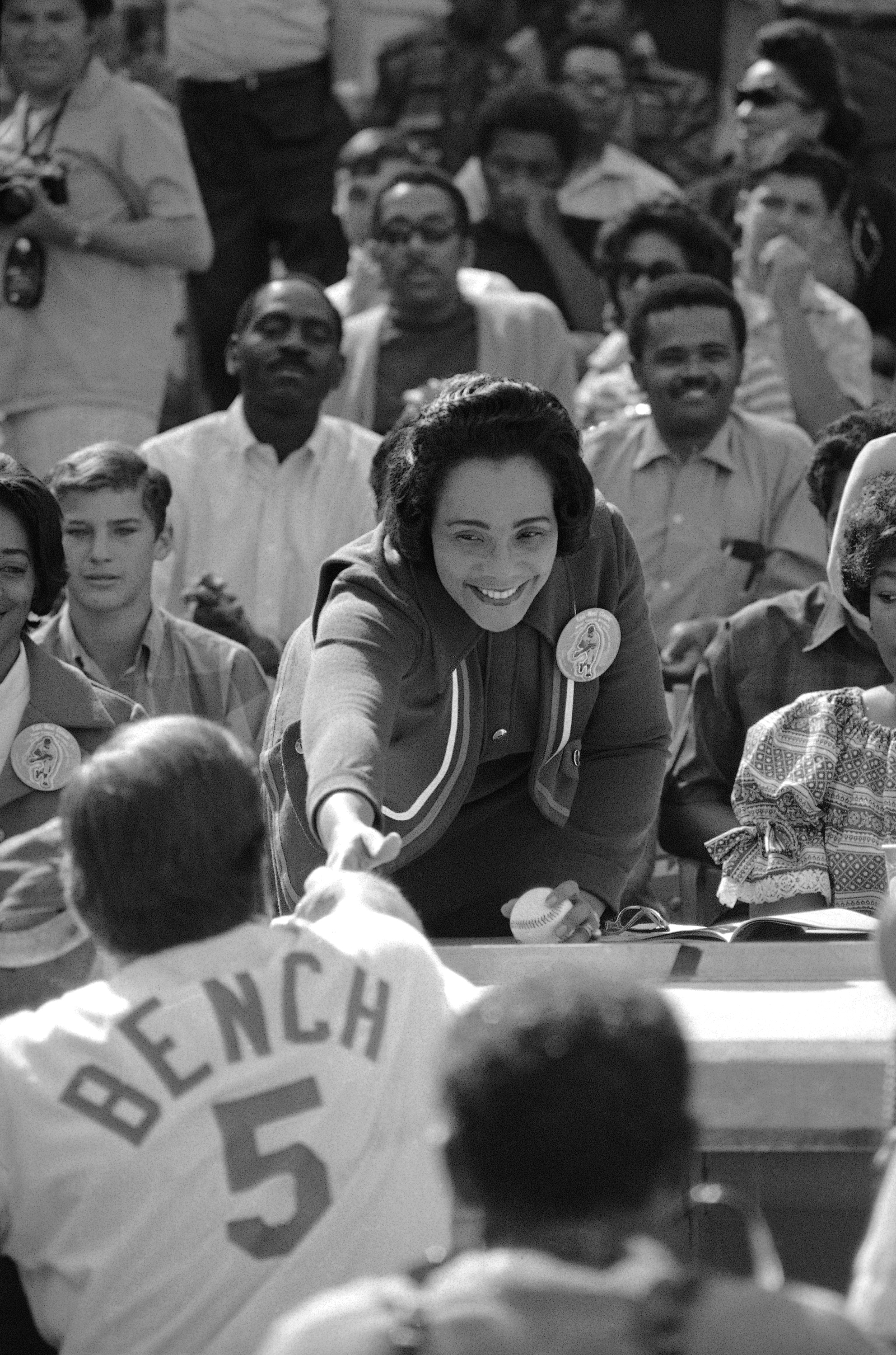 Mrs. Coretta Scott King throwing the ceremonial first pitch to Johnny Bench.