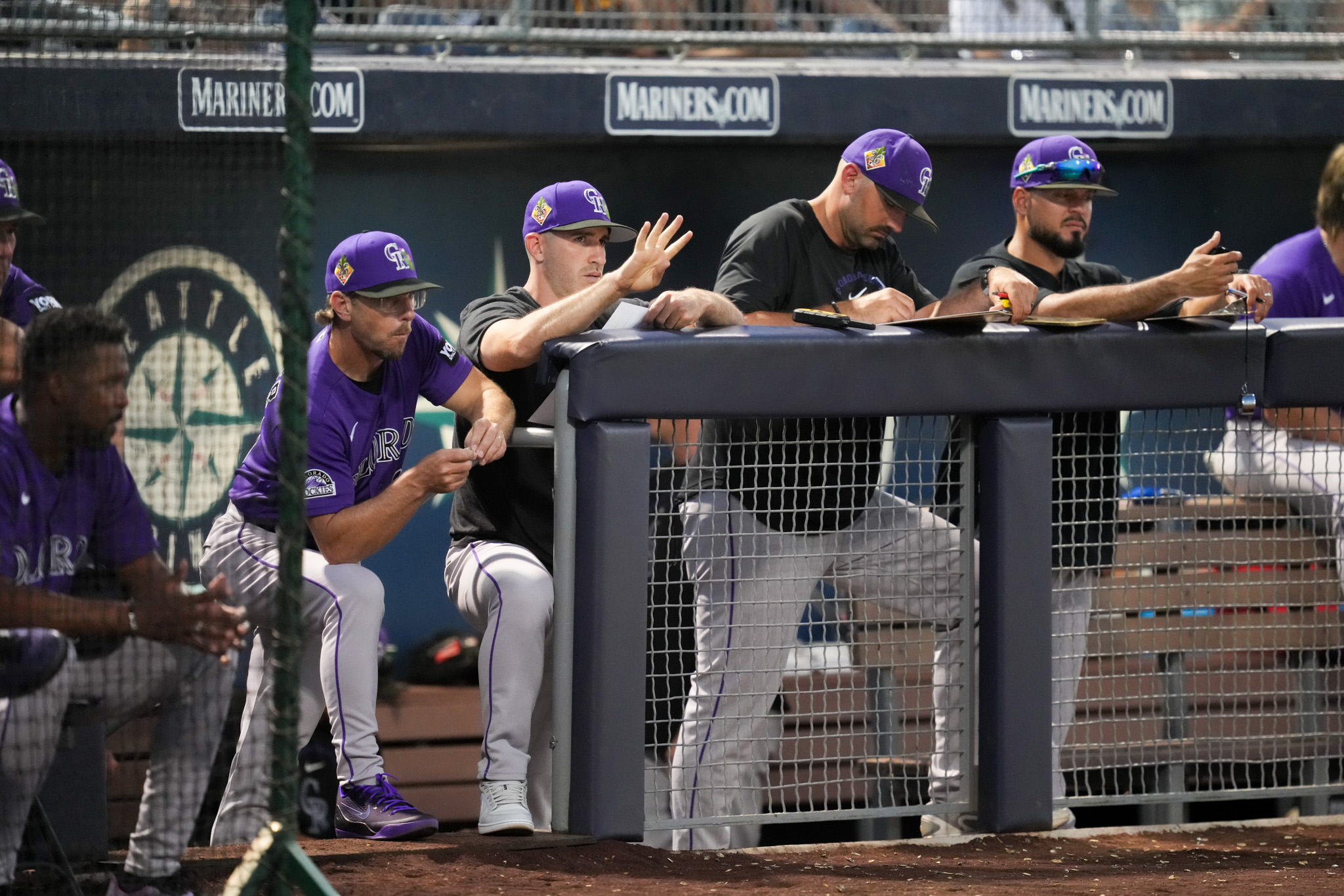 Rockies pitching coach Alon Leichman calling pitches.