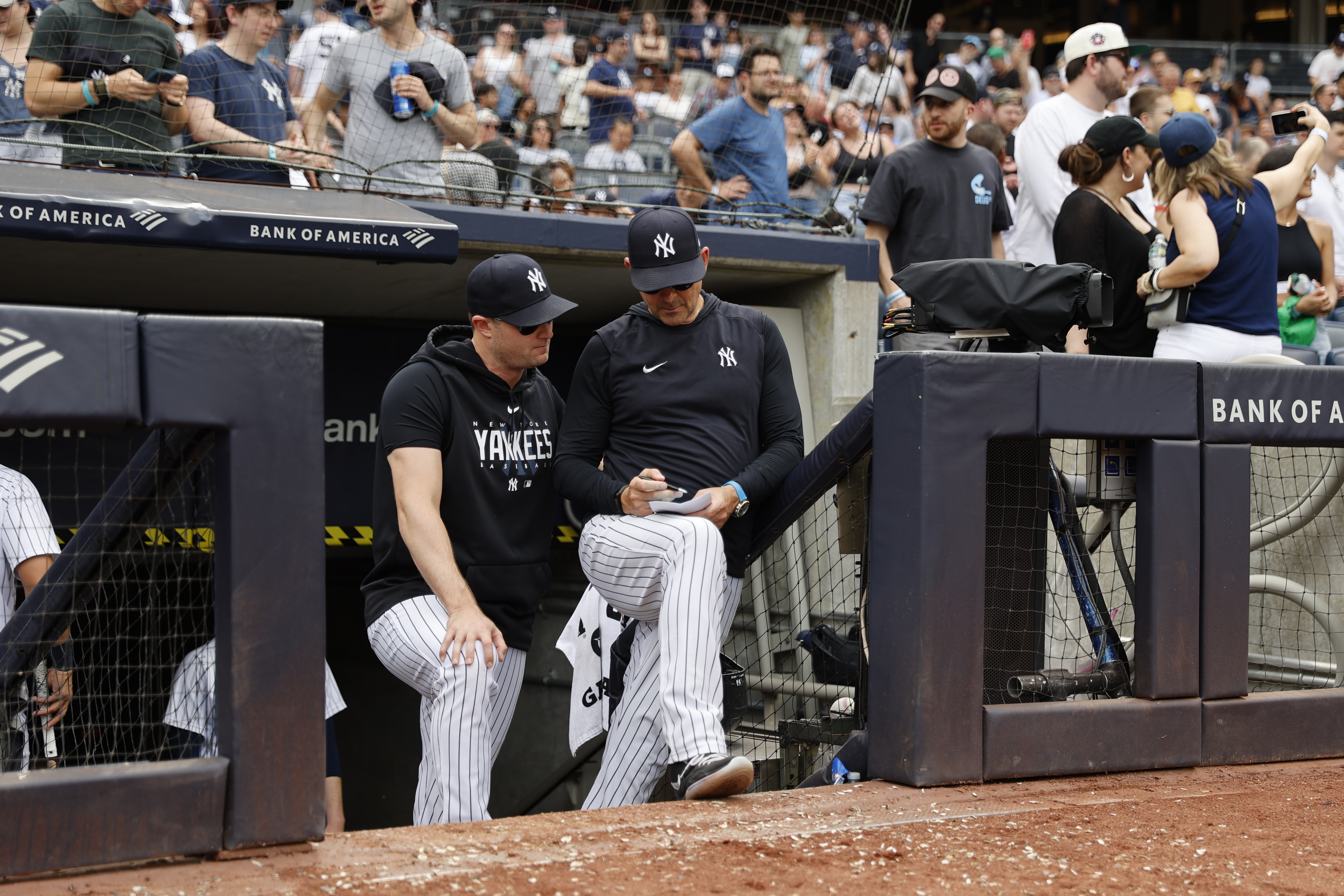 Gerrit Cole’s effectiveness on the mound is evident in the box scores. On the days in between starts, though, he prides himself on impacting his team positively any way he can. Whether strategizing alongside his manager, Aaron Boone (right), or working with other pitchers on the Yankees’ staff, Cole stays plenty busy on his “off” days. “On the days he’s not pitching, I feel like he’s more active,” says Aaron Judge. (Photo Credit: New York Yankees)