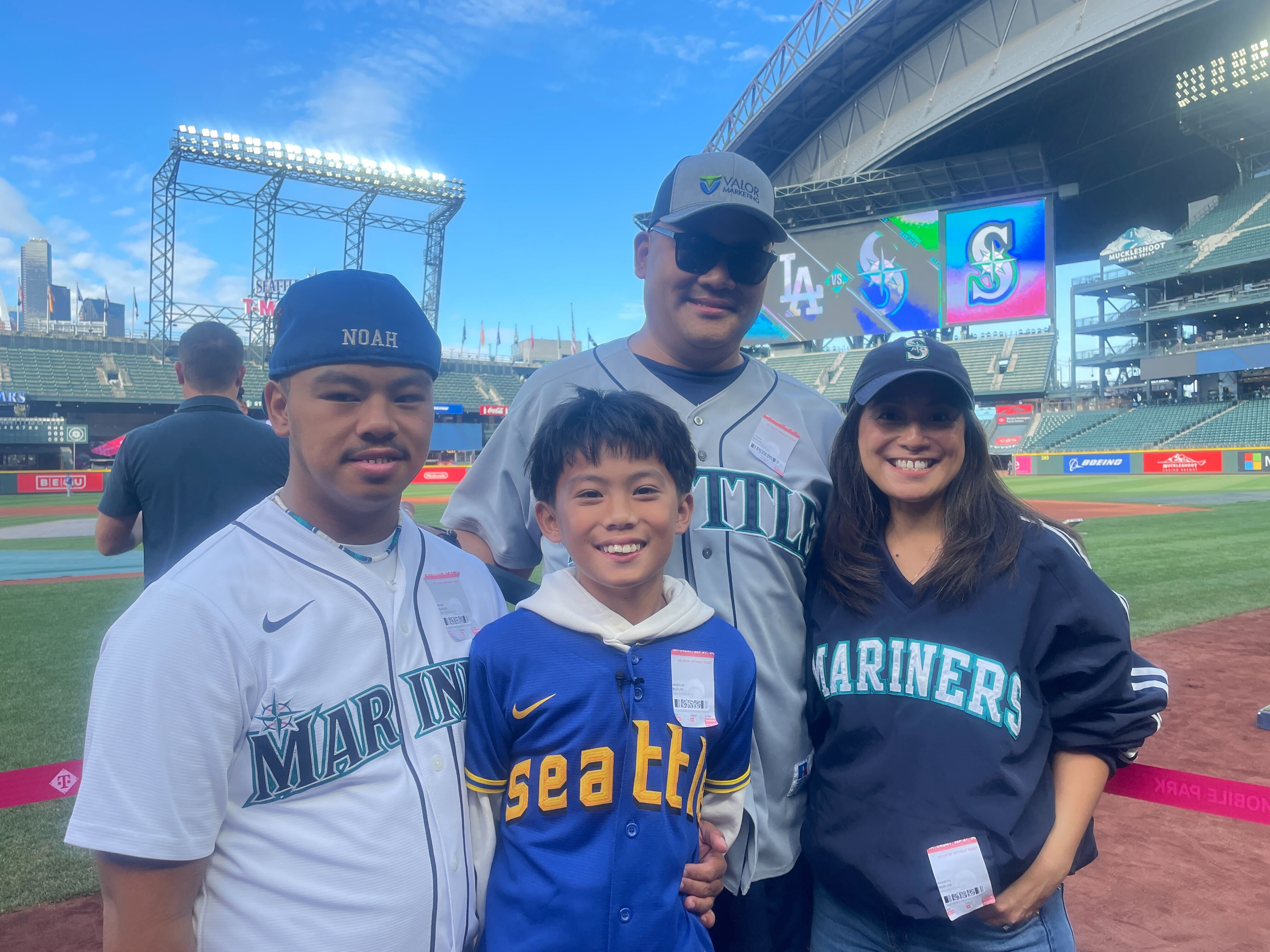 Marcus, center, with his family.