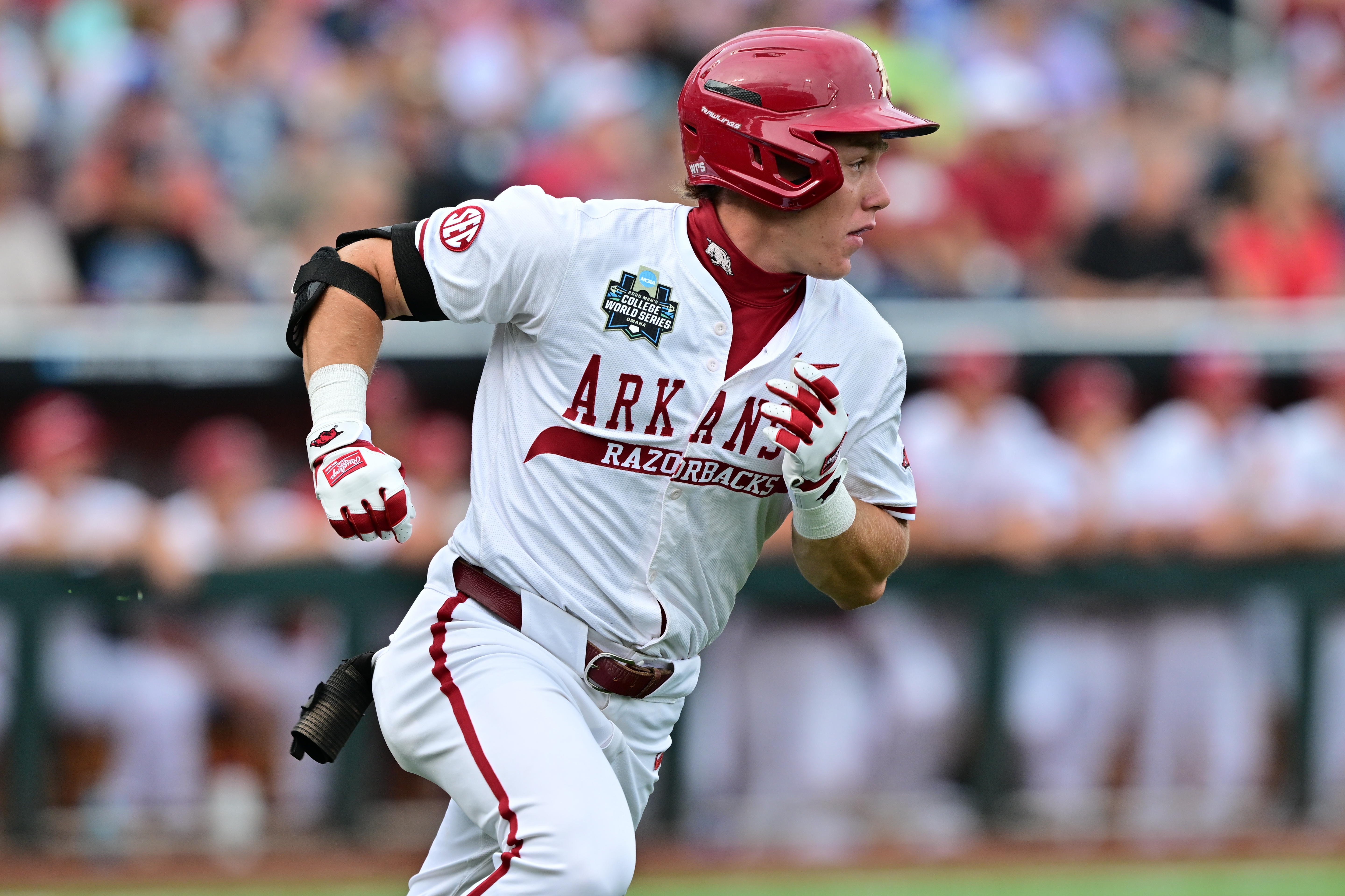 Charles Davalan runs the bases. Photo courtesy Arkansas Athletics.