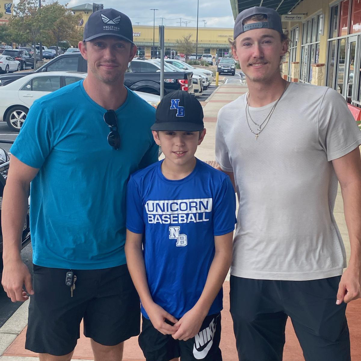 Bryce Miller and Jordan Westburg with Griffin, the son of New Braunfels High baseball coach Bobby Alford, over Thanksgiving 2021.