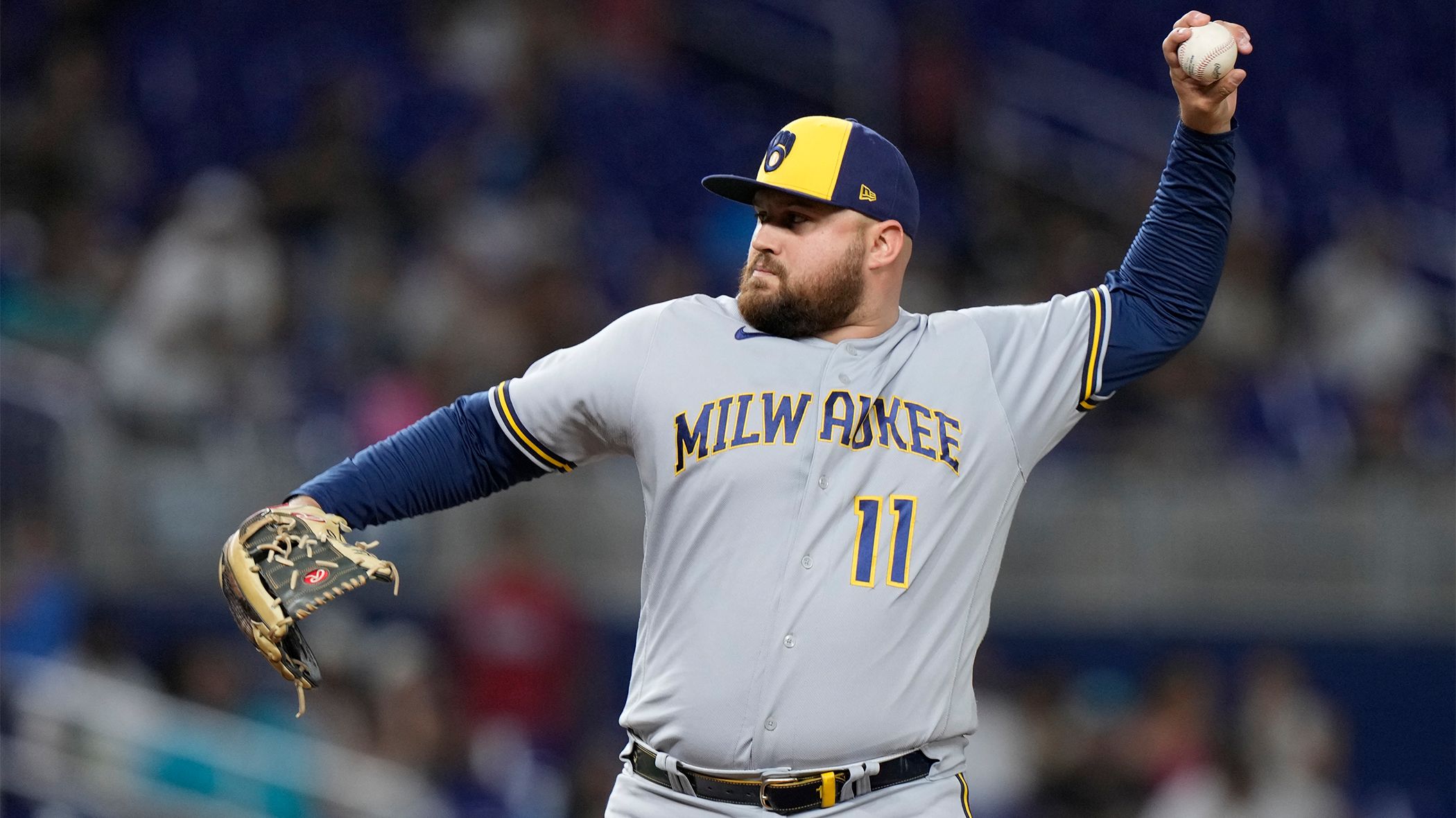 Rowdy Tellez, a position player, delivers a pitch