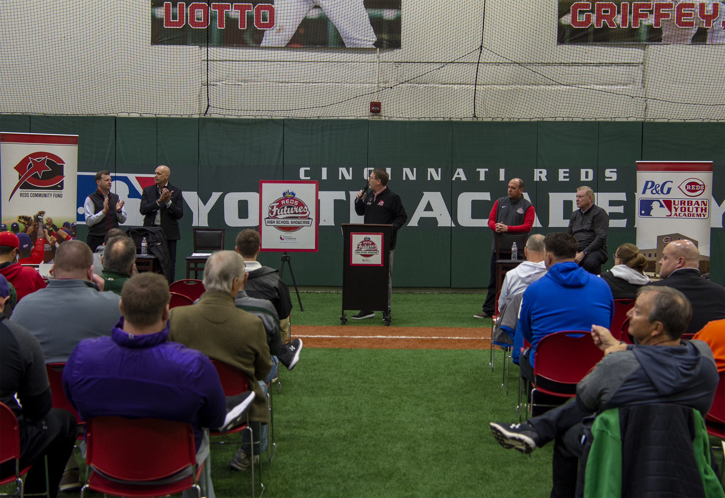 Executive Director of the Reds Community Fund Charley Frank speaks at the showcase kickoff event.