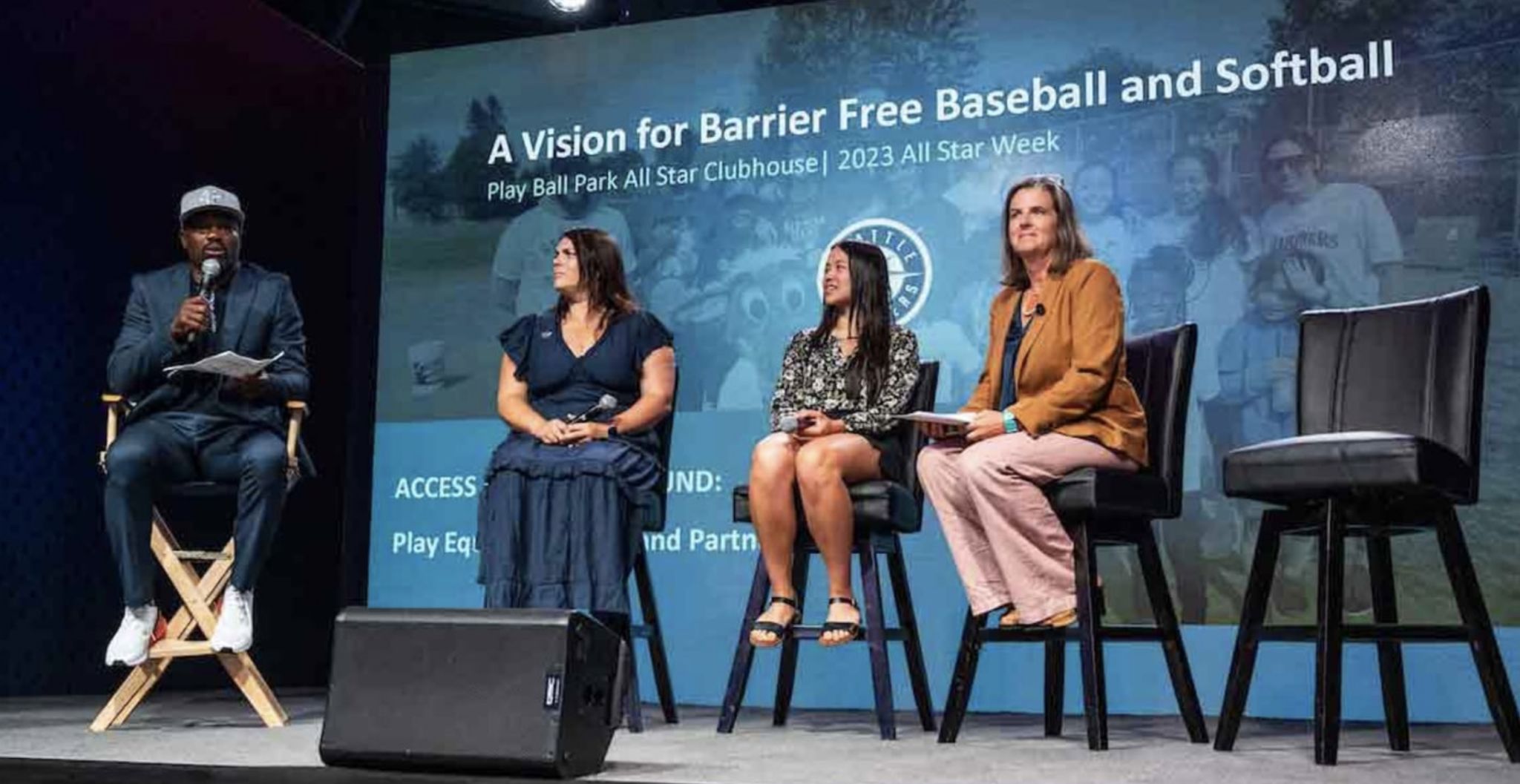 Harold Reynolds, Nova Newcomer, Cha Cha Sawyer and Julie McCleery speaking on a panel for barrier-free baseball and softball access during 2023 All-Star Week.