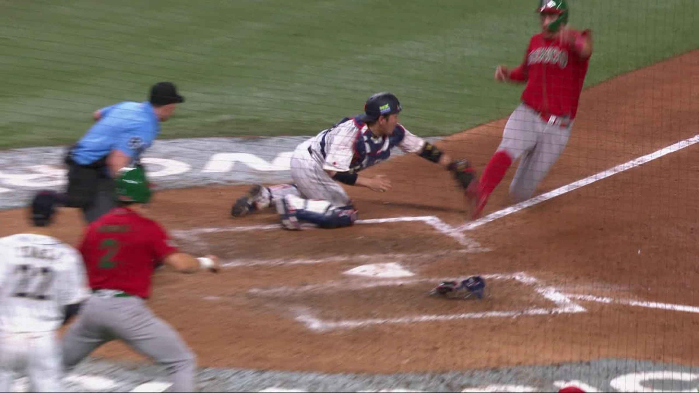 1st base runner Alan Trejo of Mexico tries to steal 2nd base when