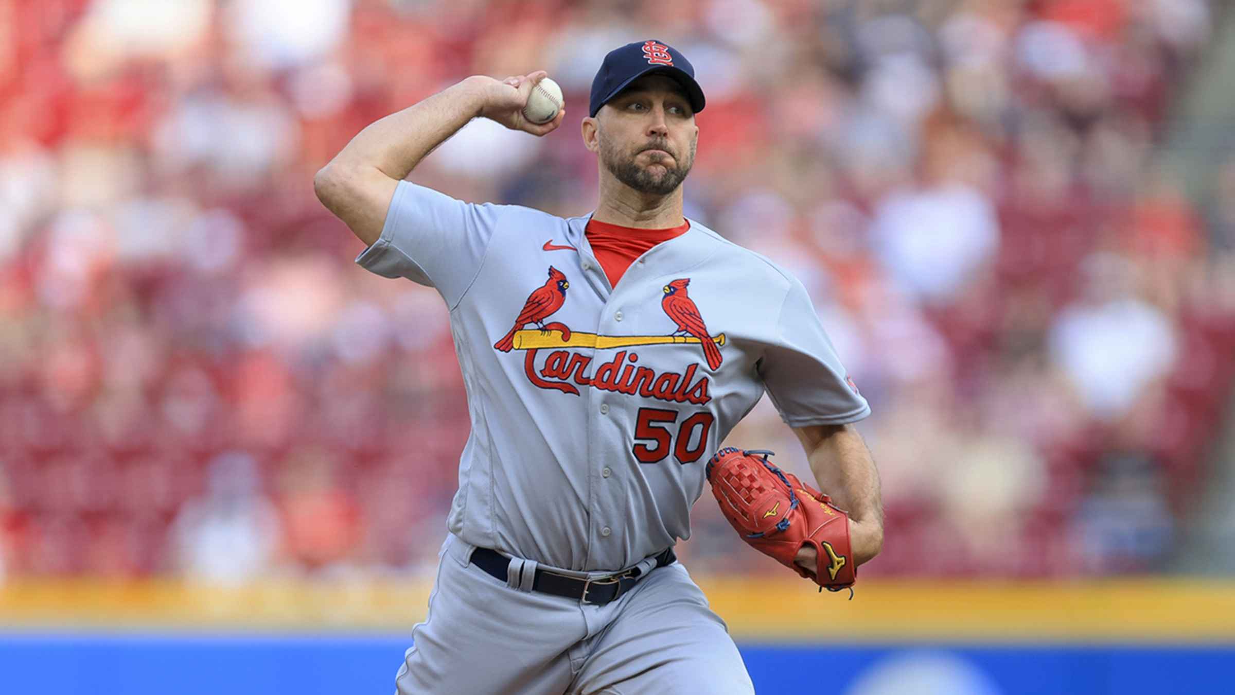 Goldschmidt hits two homers as Wainwright, Cardinals beat Reds