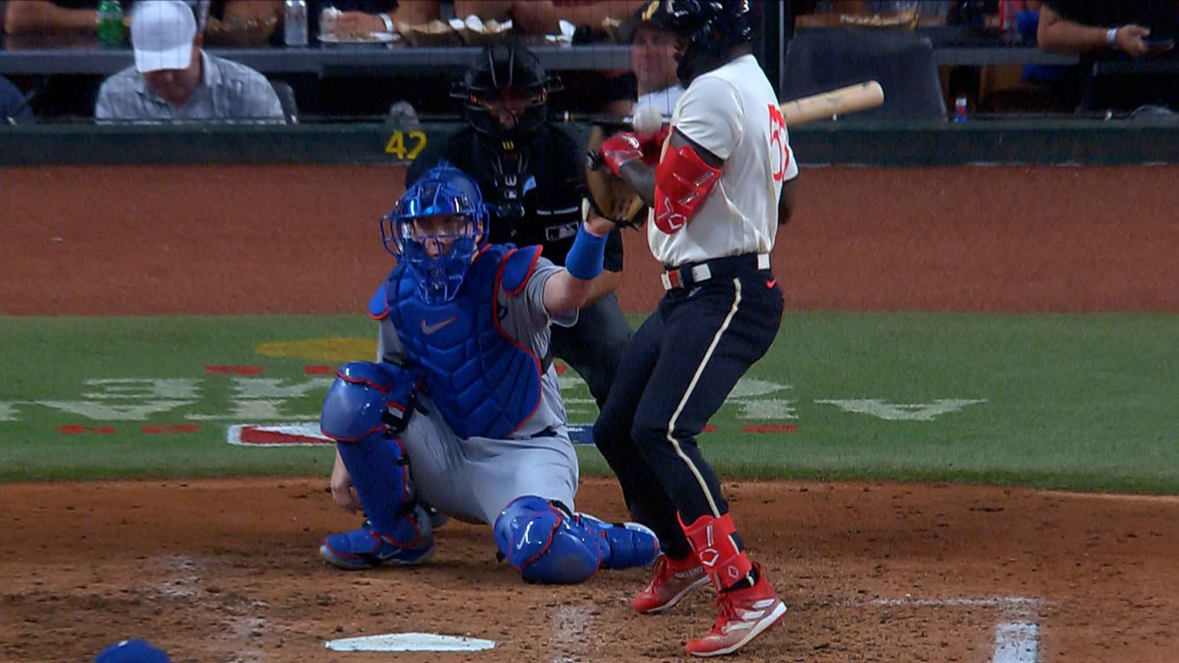 Rangers slugger Adolis García, leading the AL in RBIs, exits game after  getting hit by a pitch