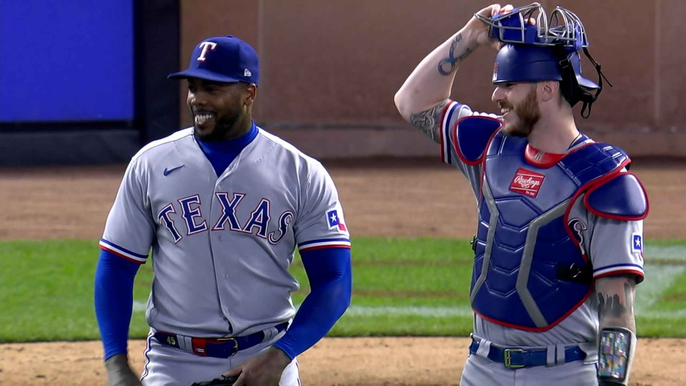 Texas Rangers' Ezequiel Duran, left, is caught stealing second