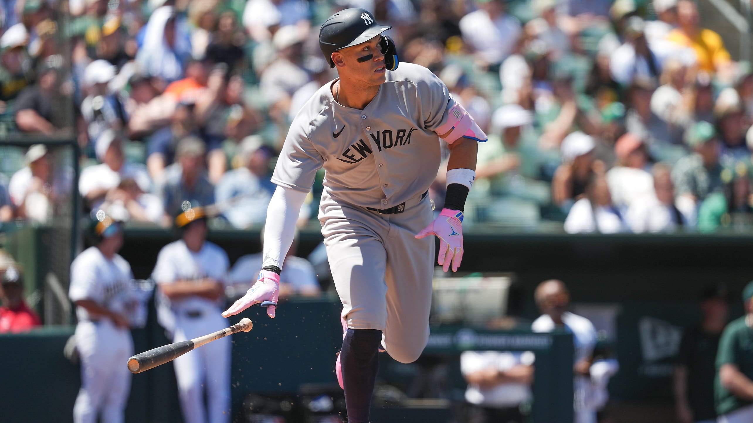 Aaron Judge drops his bat as he watches the flight of a home run