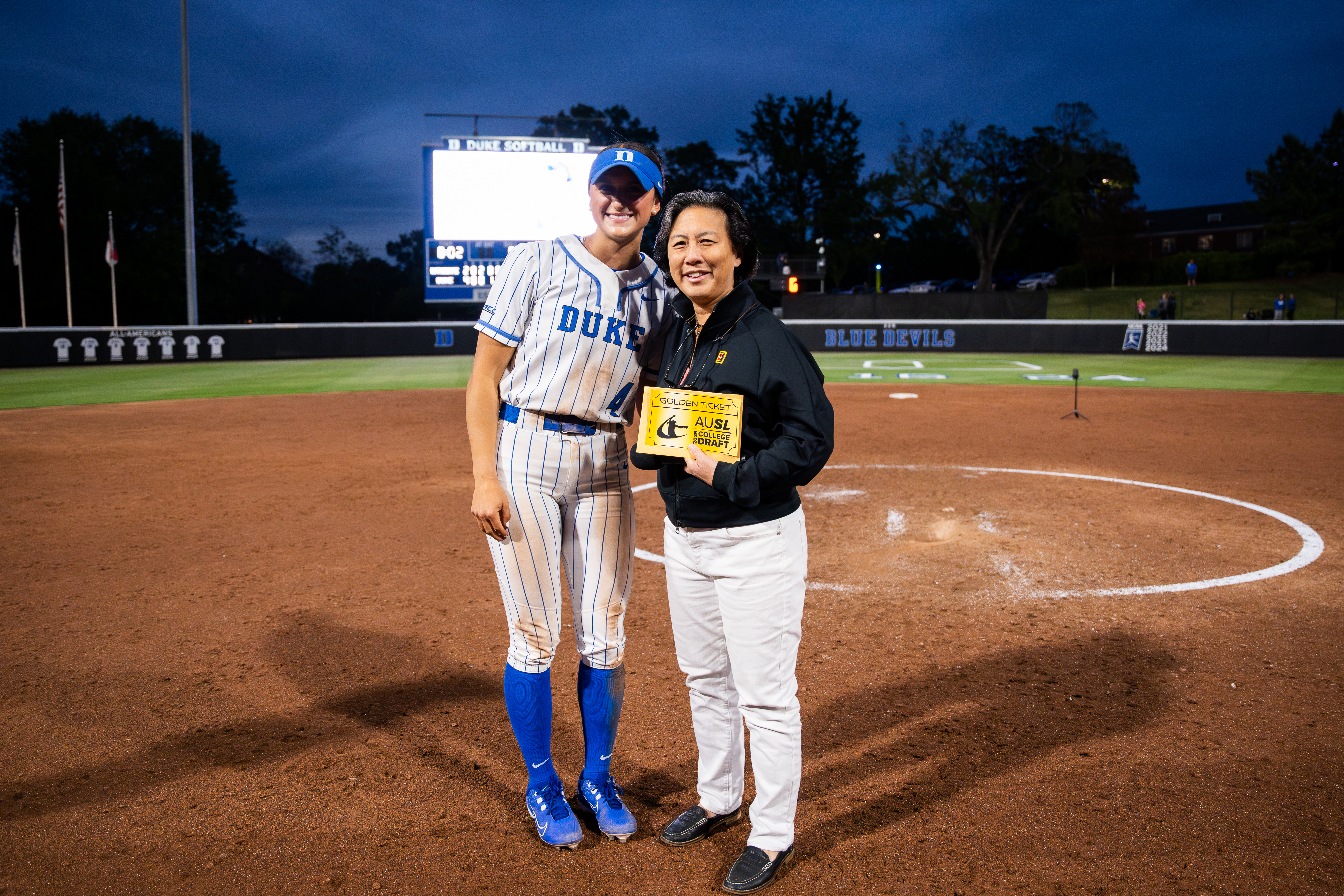Kim Ng hands a golden ticket to a Duke softball player