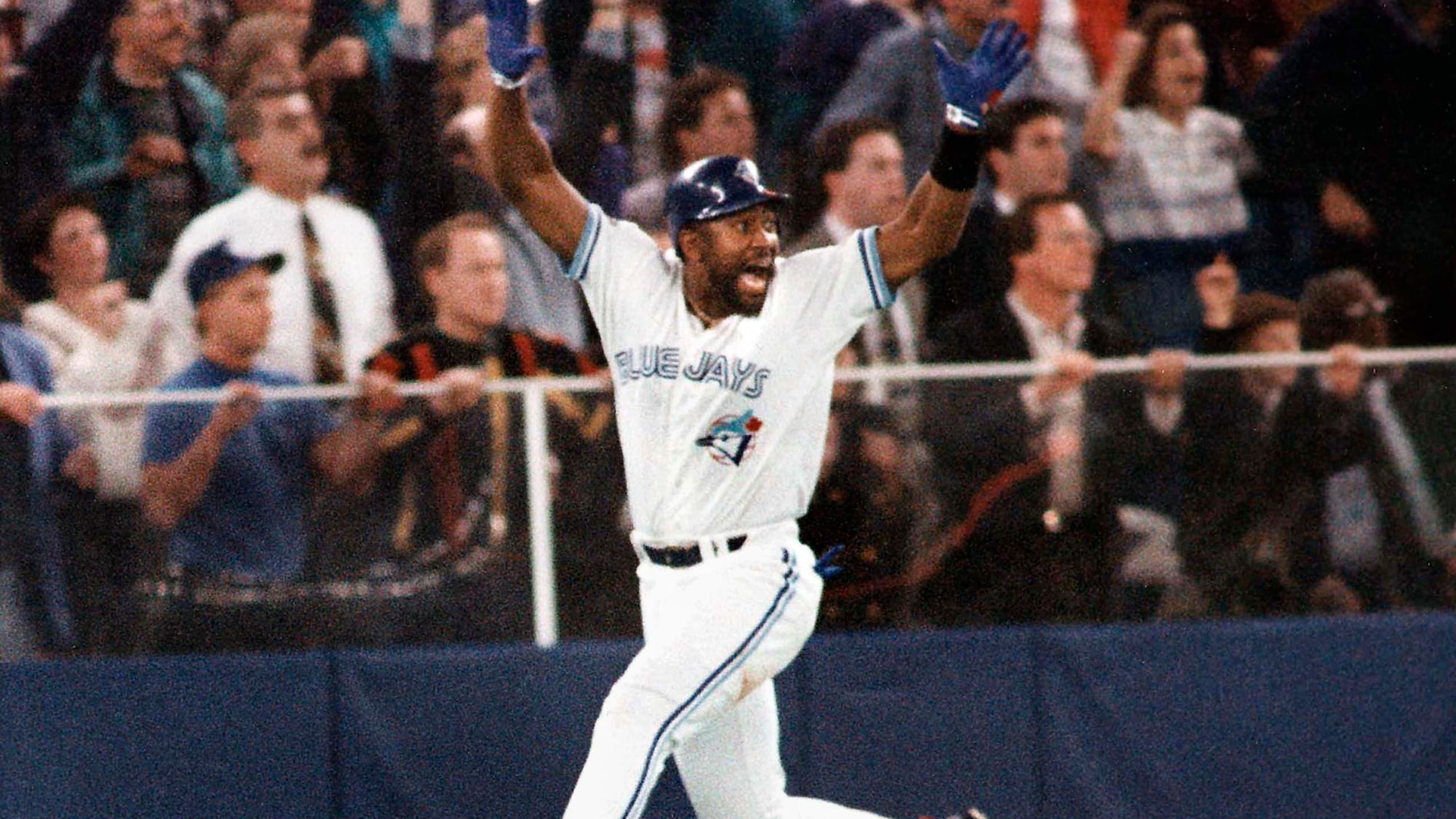 Joe Carter celebrates his World Series-winning home run