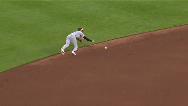 An animated gif of Joey Ortiz making a diving stop and throw