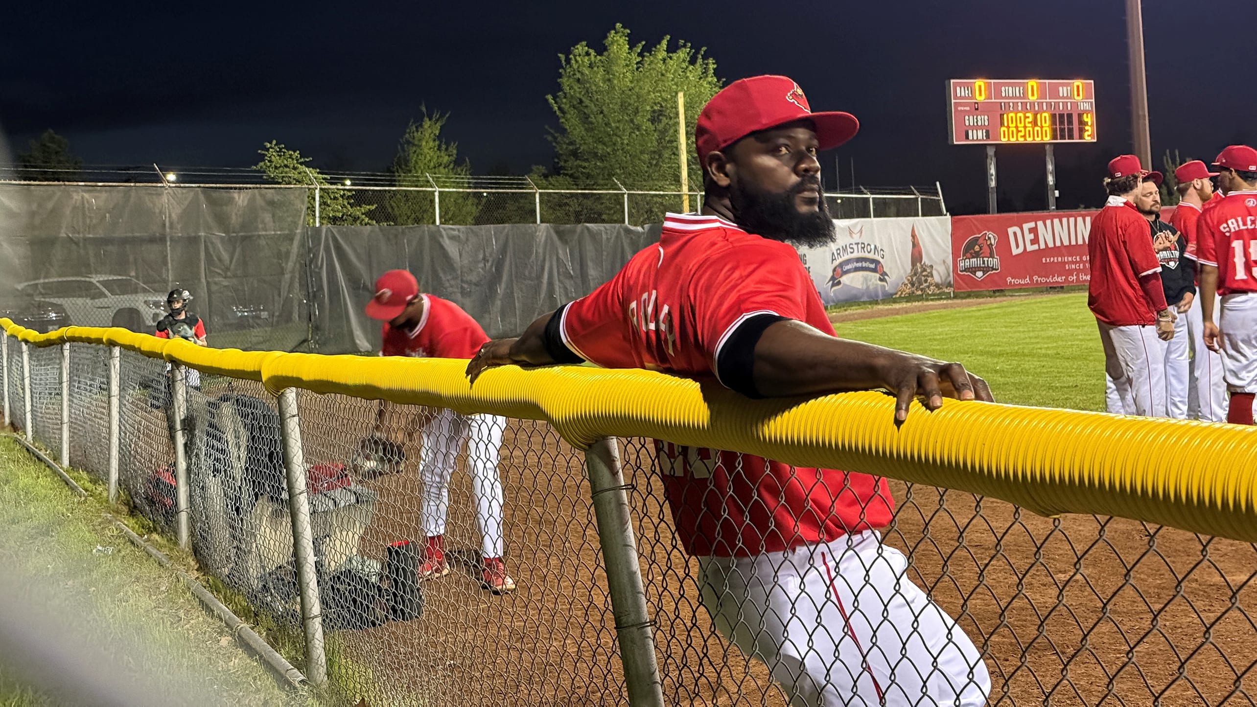 Fernando Rodney leans against a fence