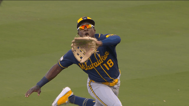 An animated gif of Luis Lara making a sliding catch