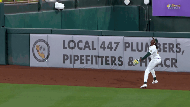 An animated gif of Lawrence Butler making a leaping catch