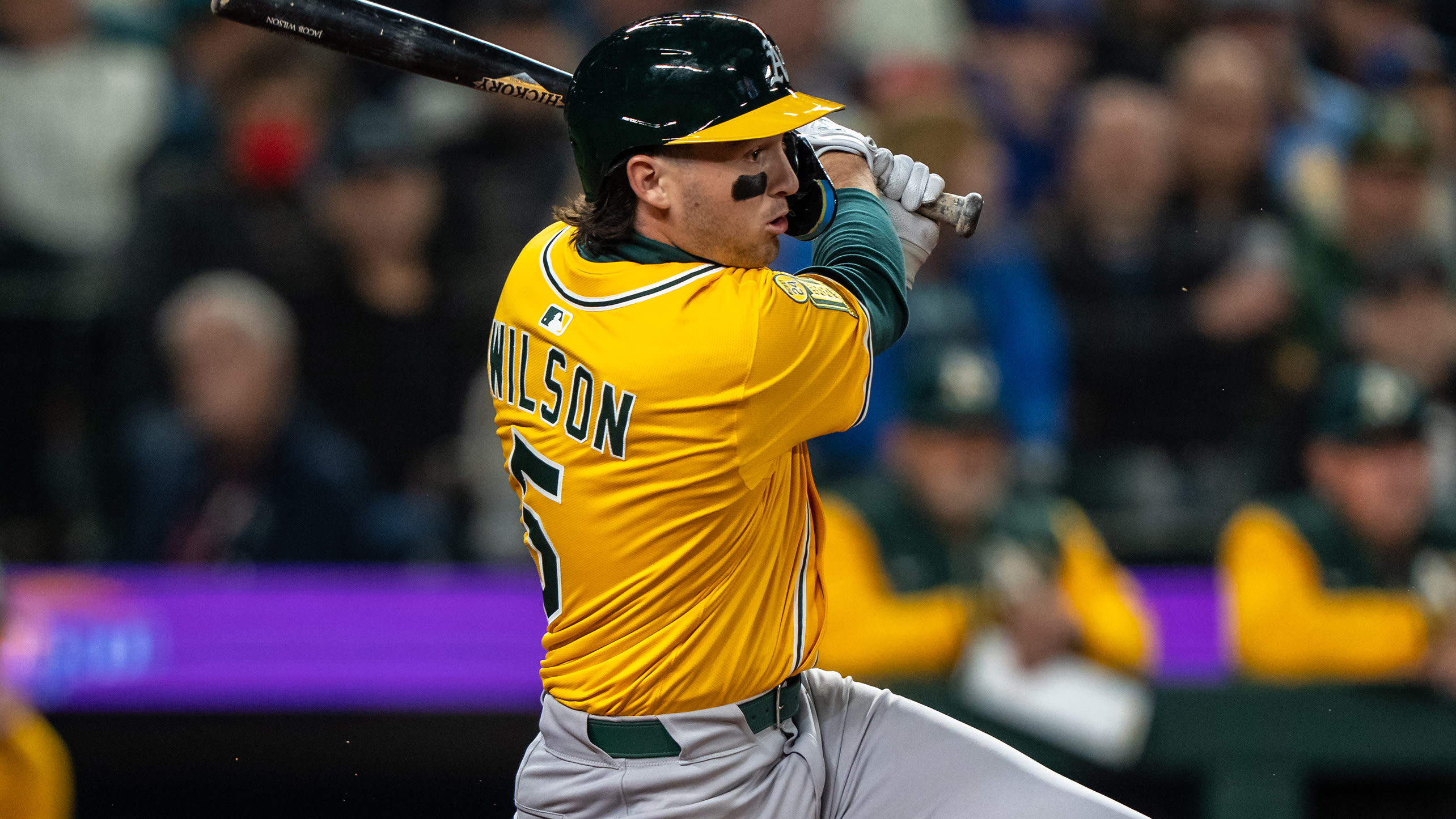Jacob Wilson of the A's follows through on a swing