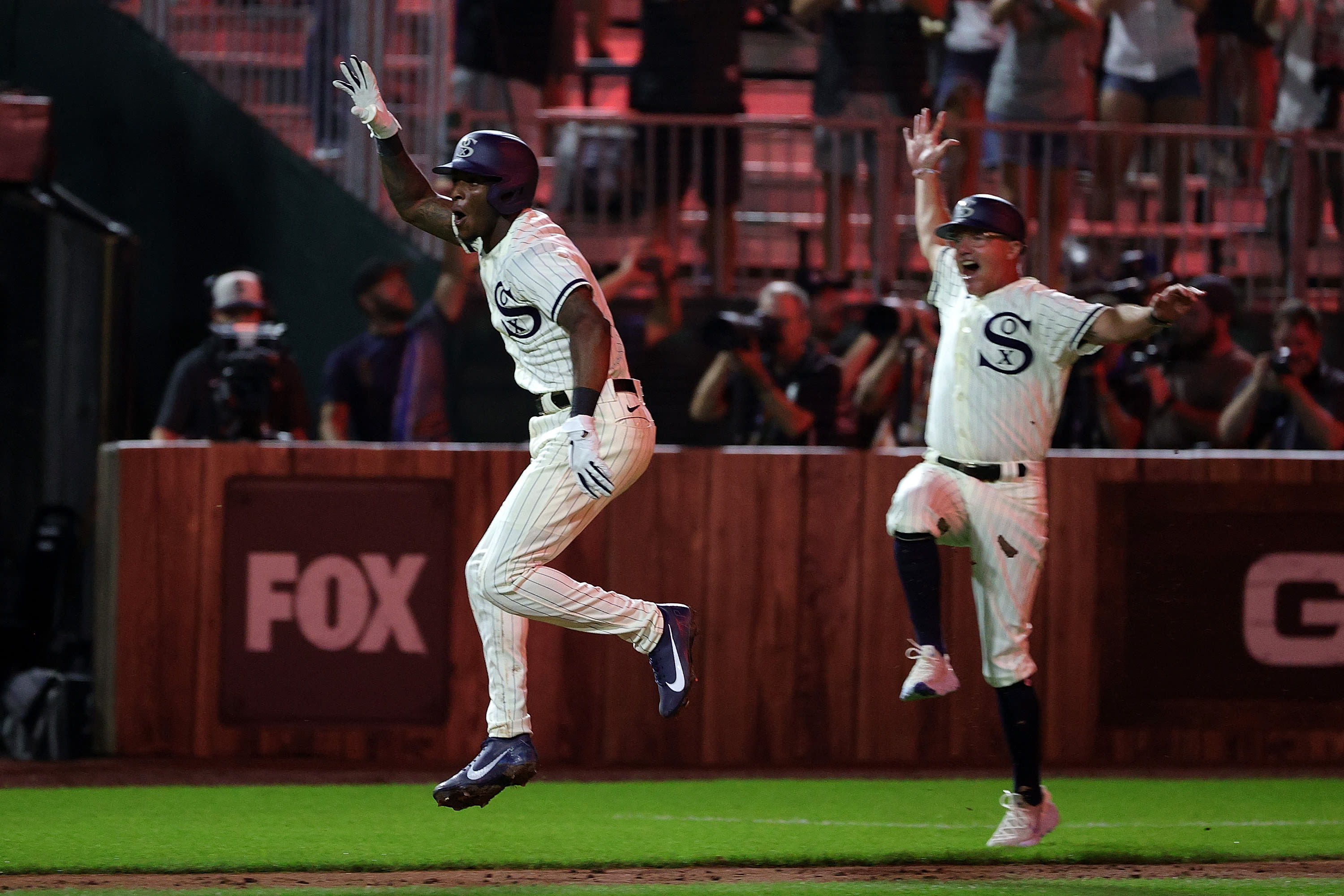 Tim Anderson celebrates his walk-off home run in the first MLB at Field of Dreams Game