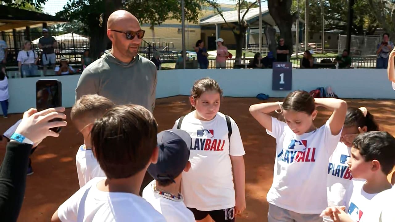 Derek Jeter with a group of kids