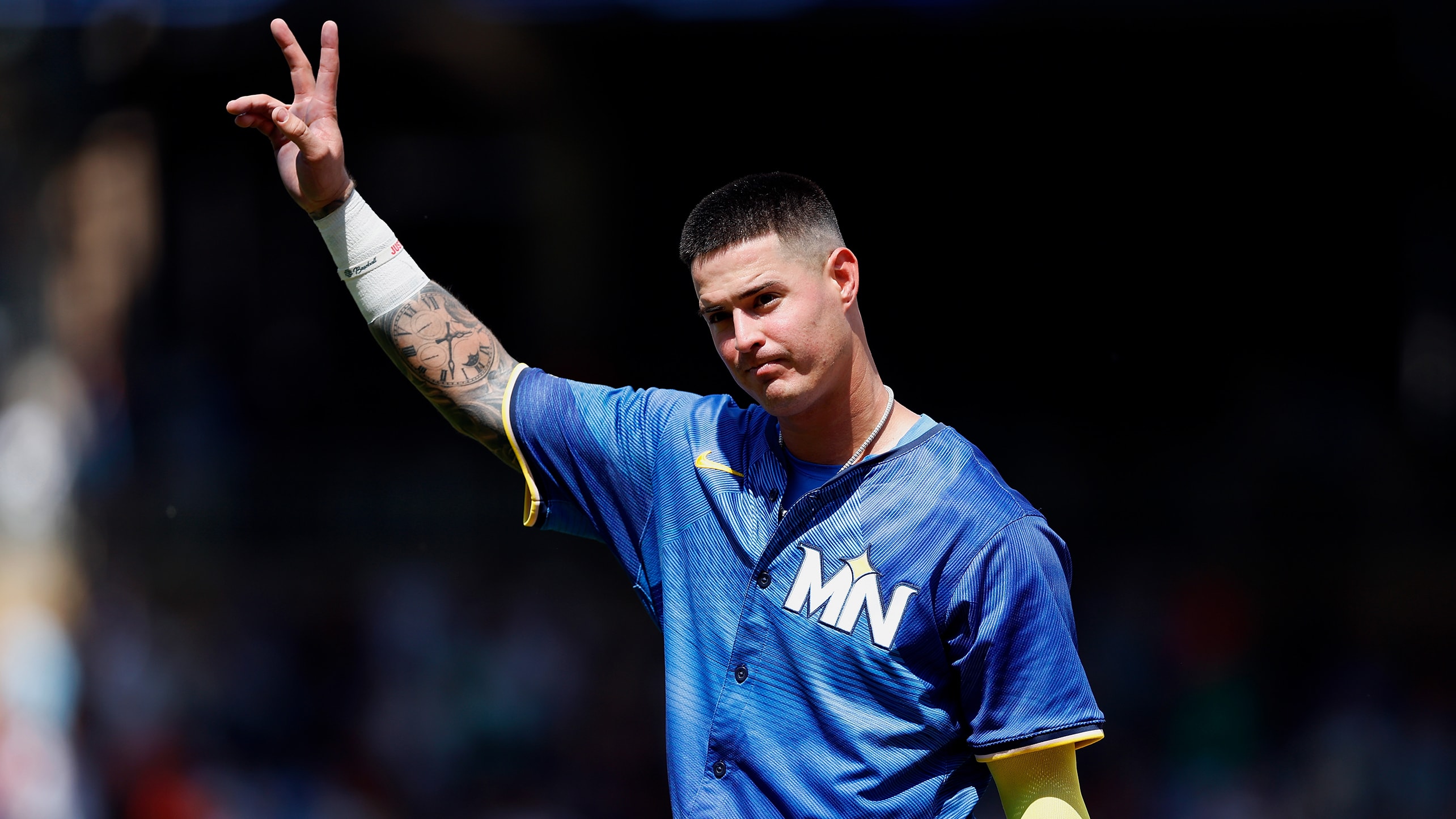 Jose Miranda waves to the crowd