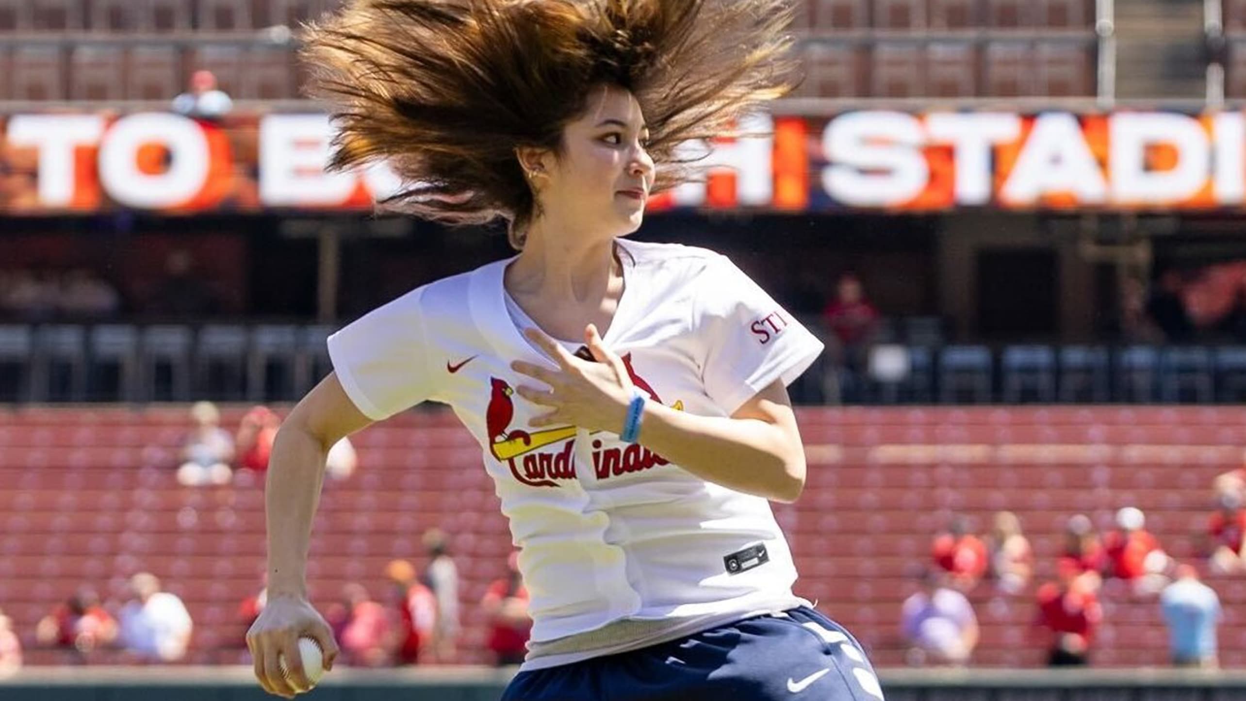 Alysa Liu in a Cardinals jersey