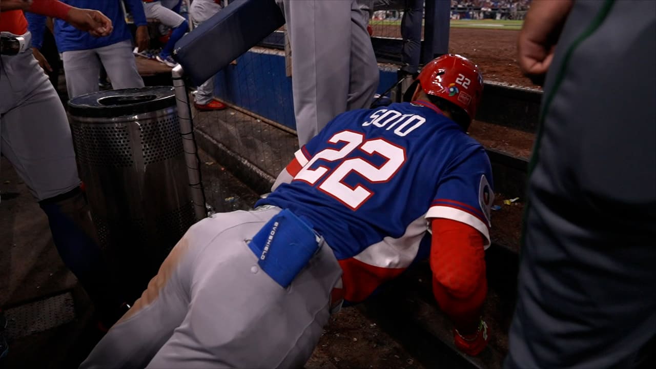 Juan Soto does some push-ups on the dugout steps