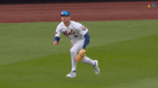An animated gif of A.J. Ewing making a diving catch