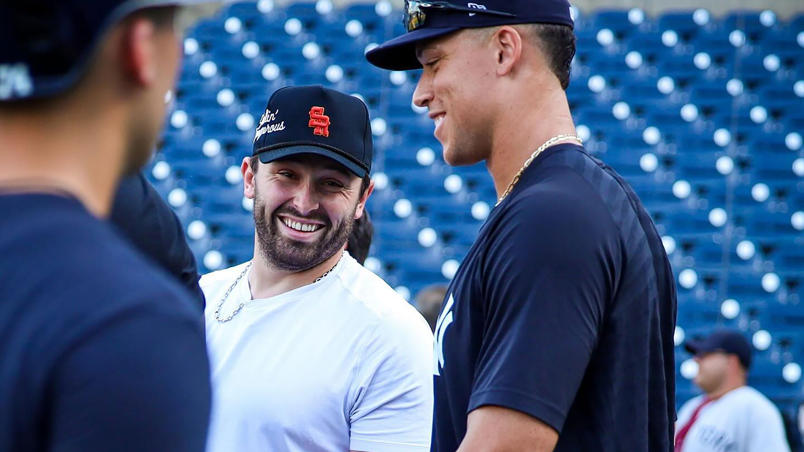 Baker Mayfield laughs with Aaron Judge