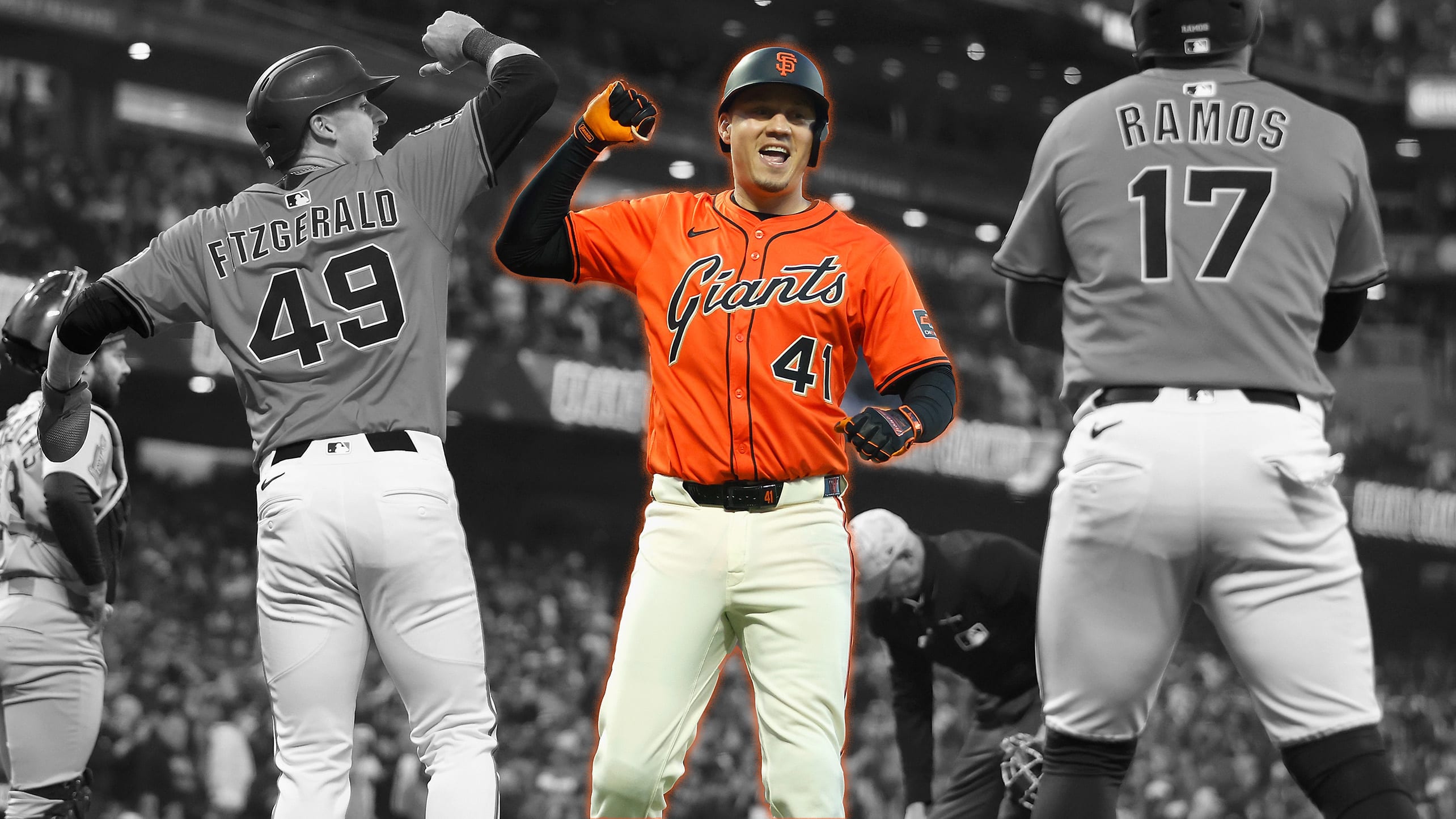 Wilmer Flores celebrates a home run with two teammates at home plate
