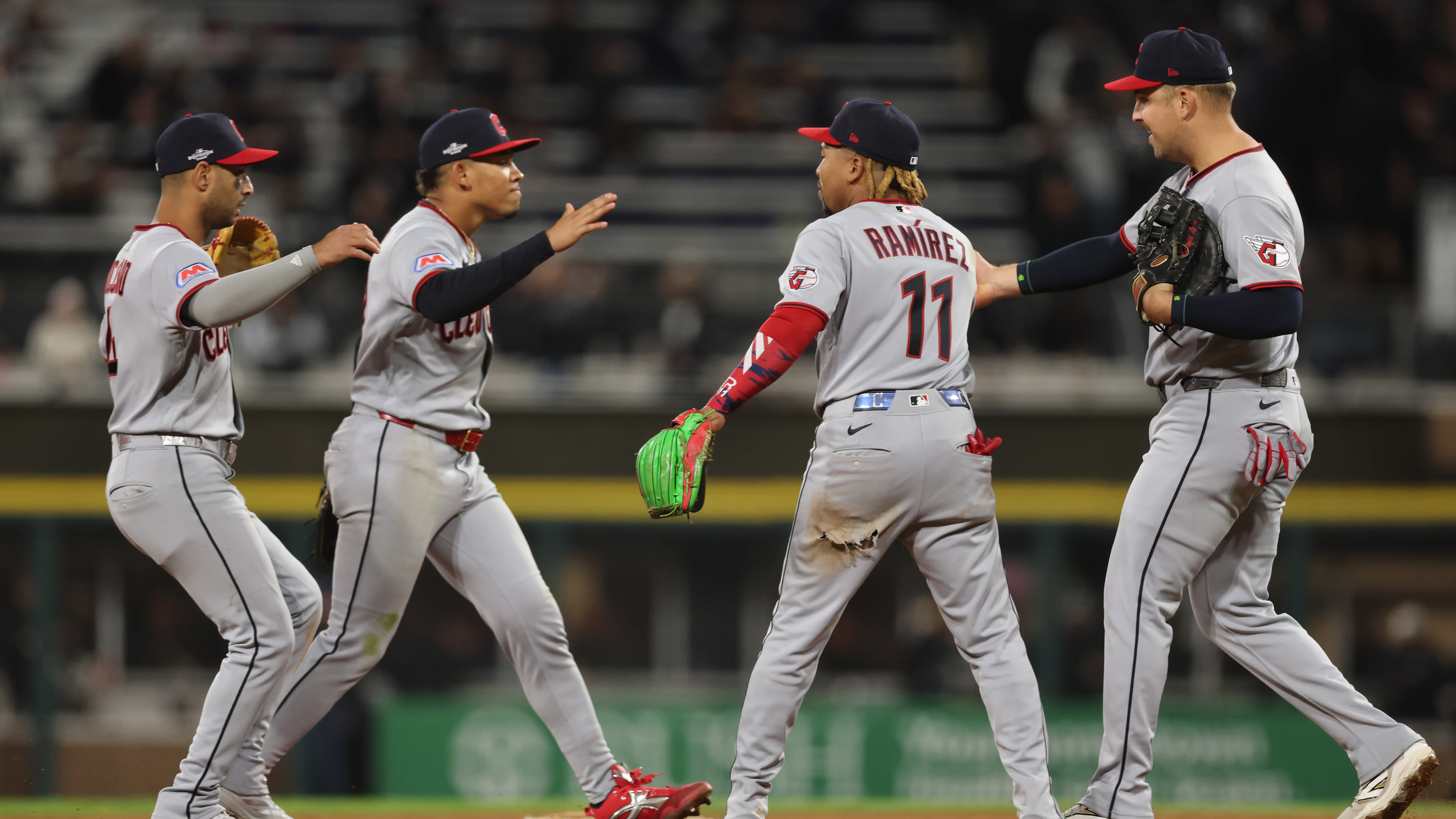 The Guardians celebrate after winning Game 4
