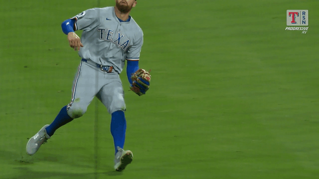 An animated gif of Cody Freeman making a juggling catch on a popup