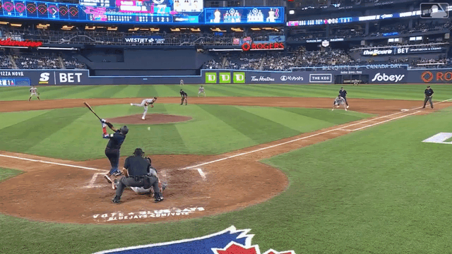 Red Sox pitcher Chris Martin makes a barehanded grab while falling backwards on the mound and throws to first