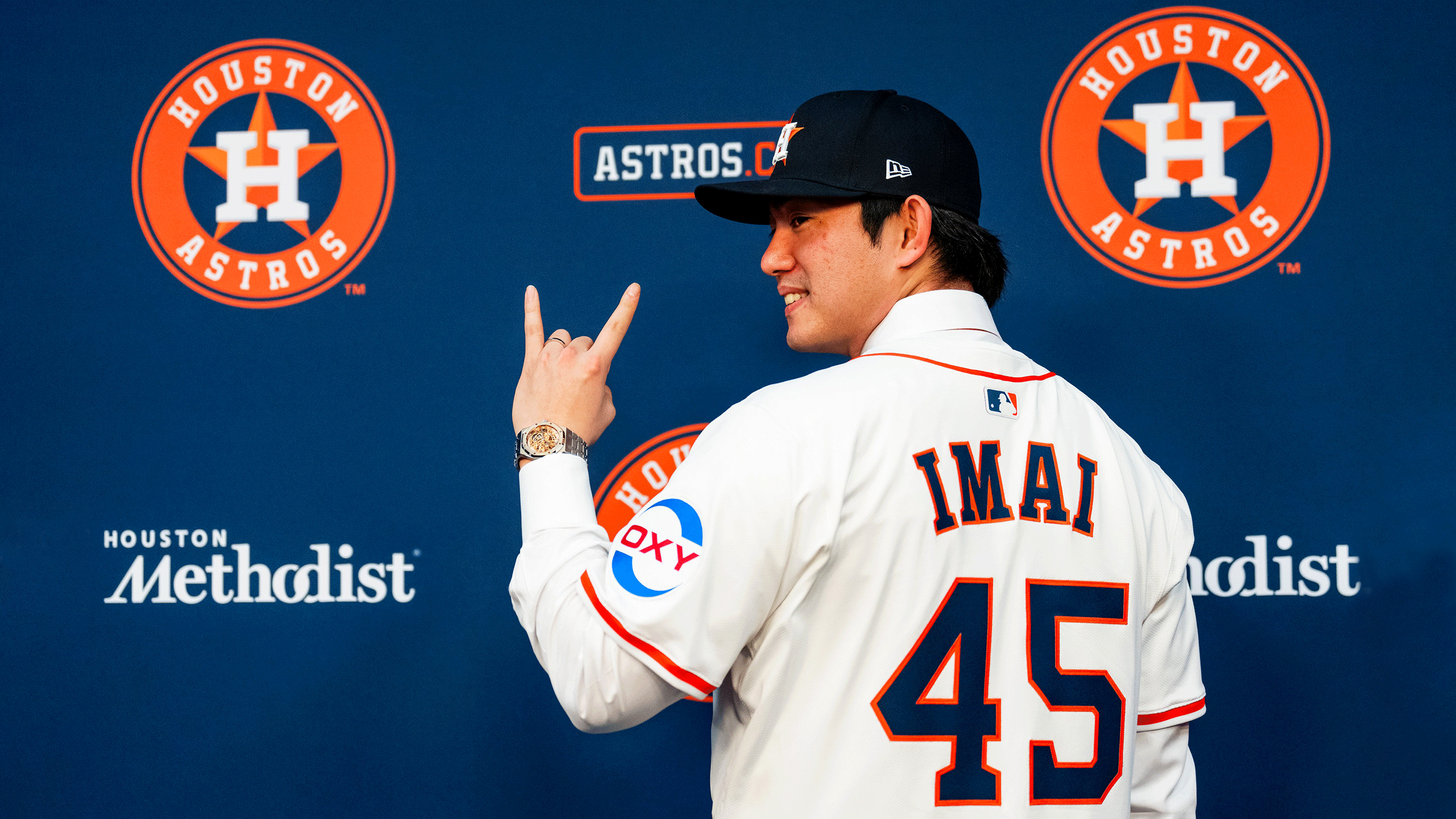 Tatsuya Imai tries on his new Astros jersey