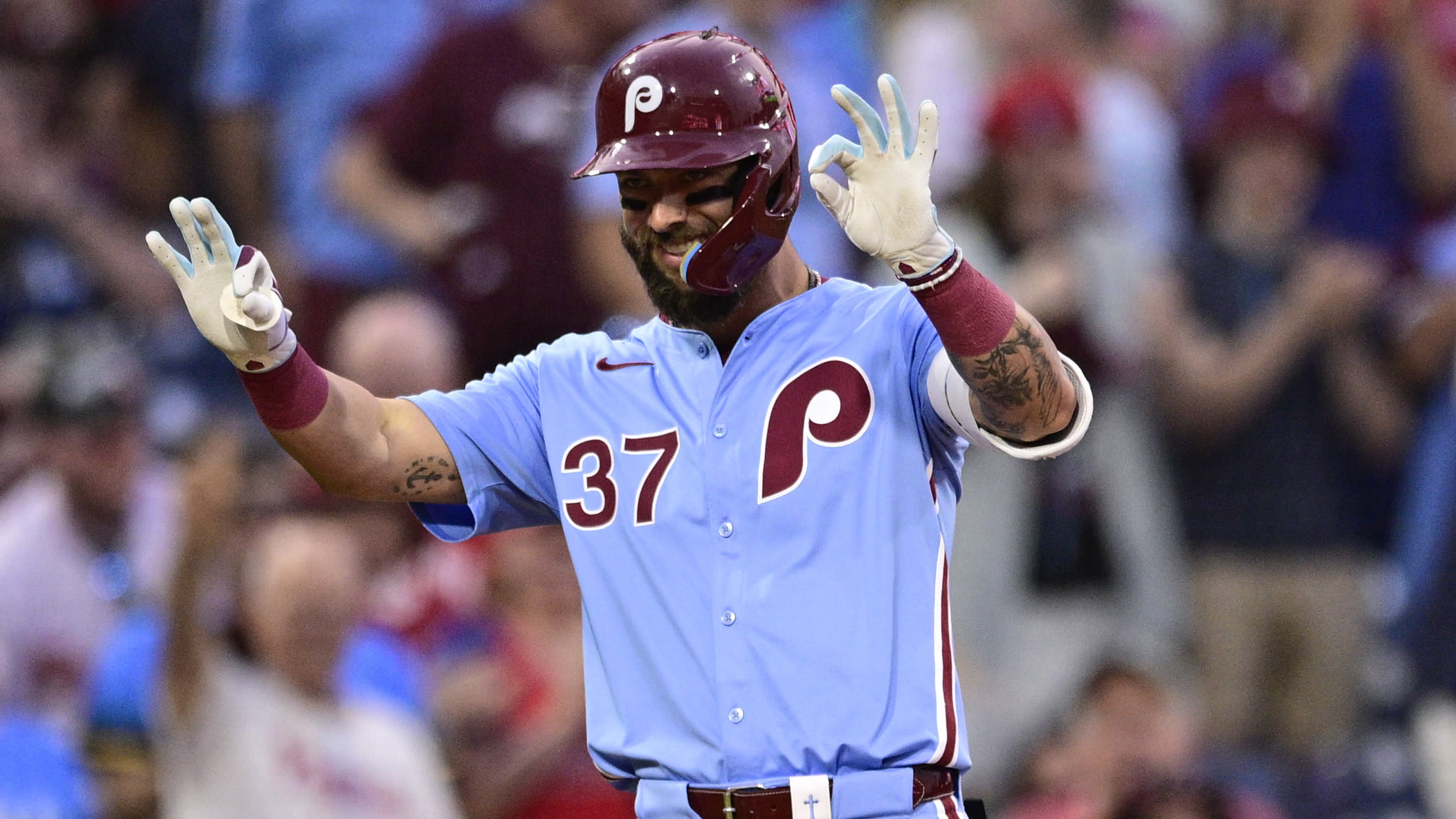 Weston Wilson celebrates after hitting for the cycle