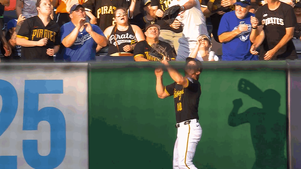 An animated gif of Bryan Reynolds leaping to rob a home run before slamming into the wall