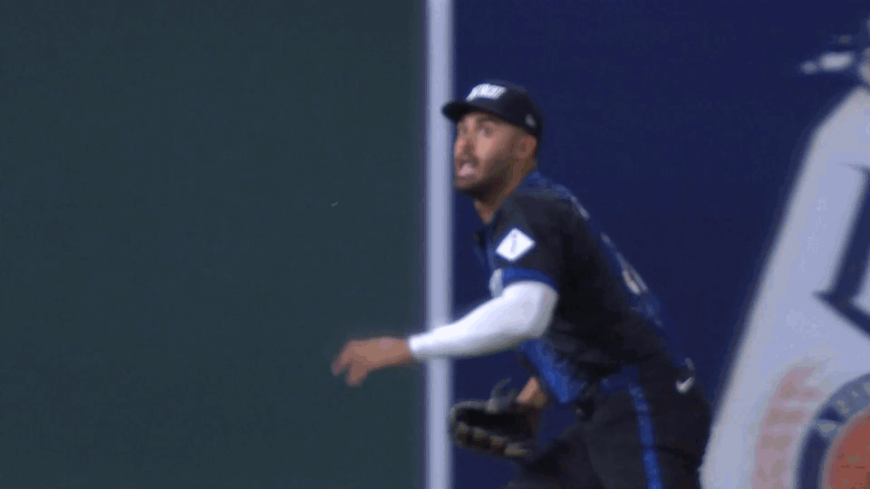 An animated gif of Riley Greene making a diving catch