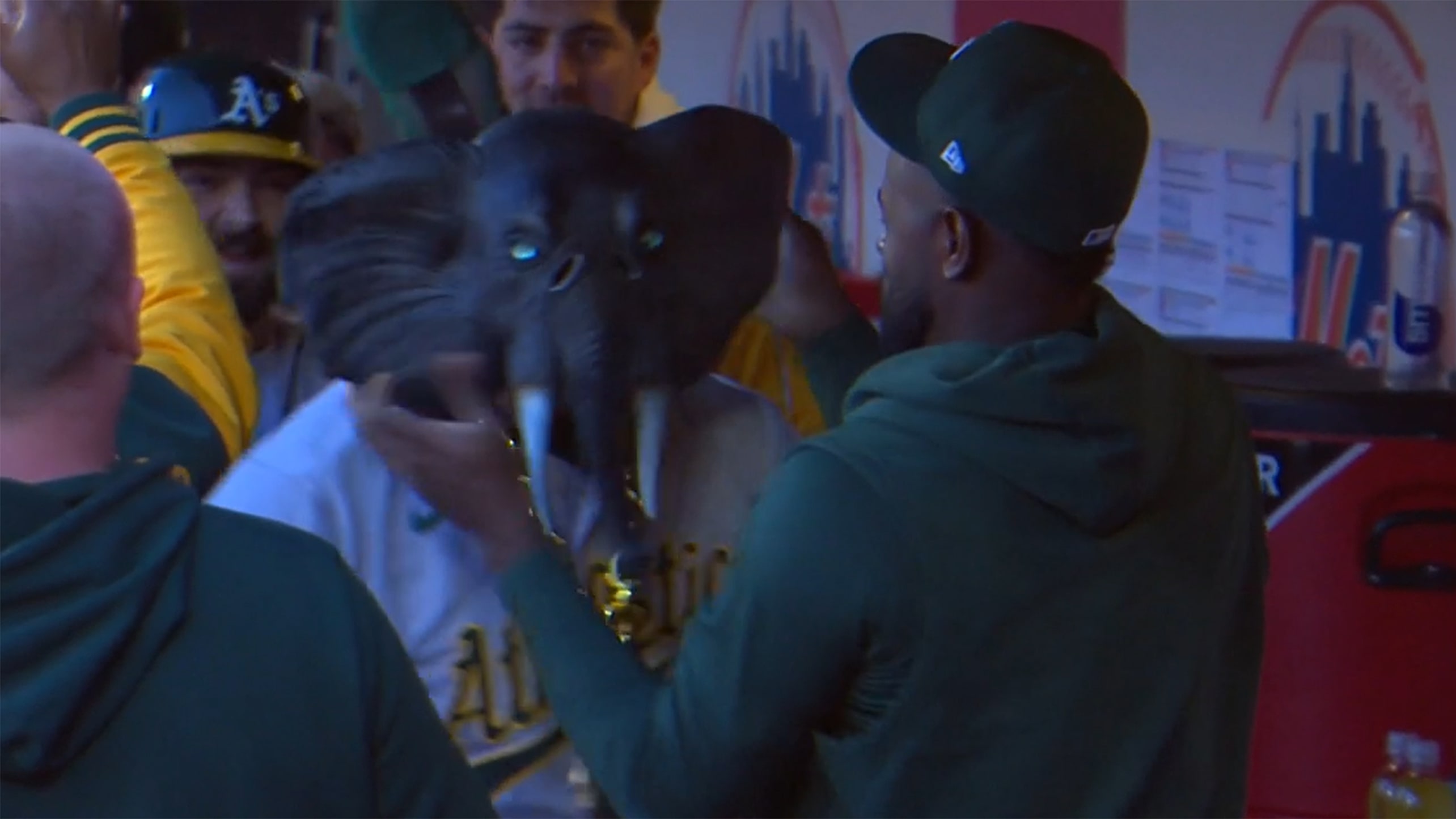 Tyler Soderstrom wears an elephant mask in the dugout