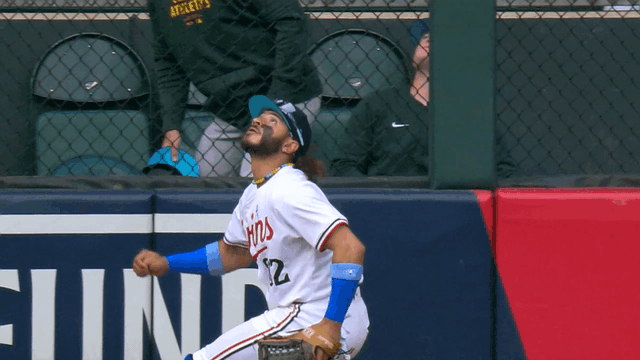 An animated GIF of Austin Martin robbing a home run