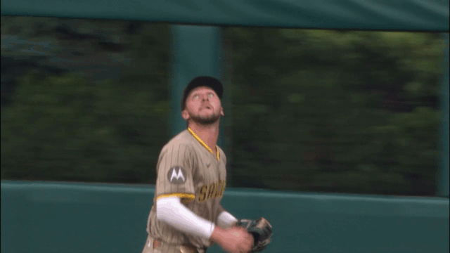 An animated gif of Jackson Merrill leaping high to rob a home run