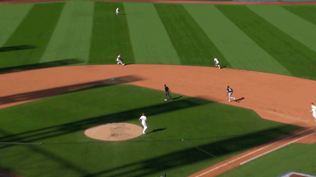 An animated gif of Brayan Rocchio making a diving stop and throw